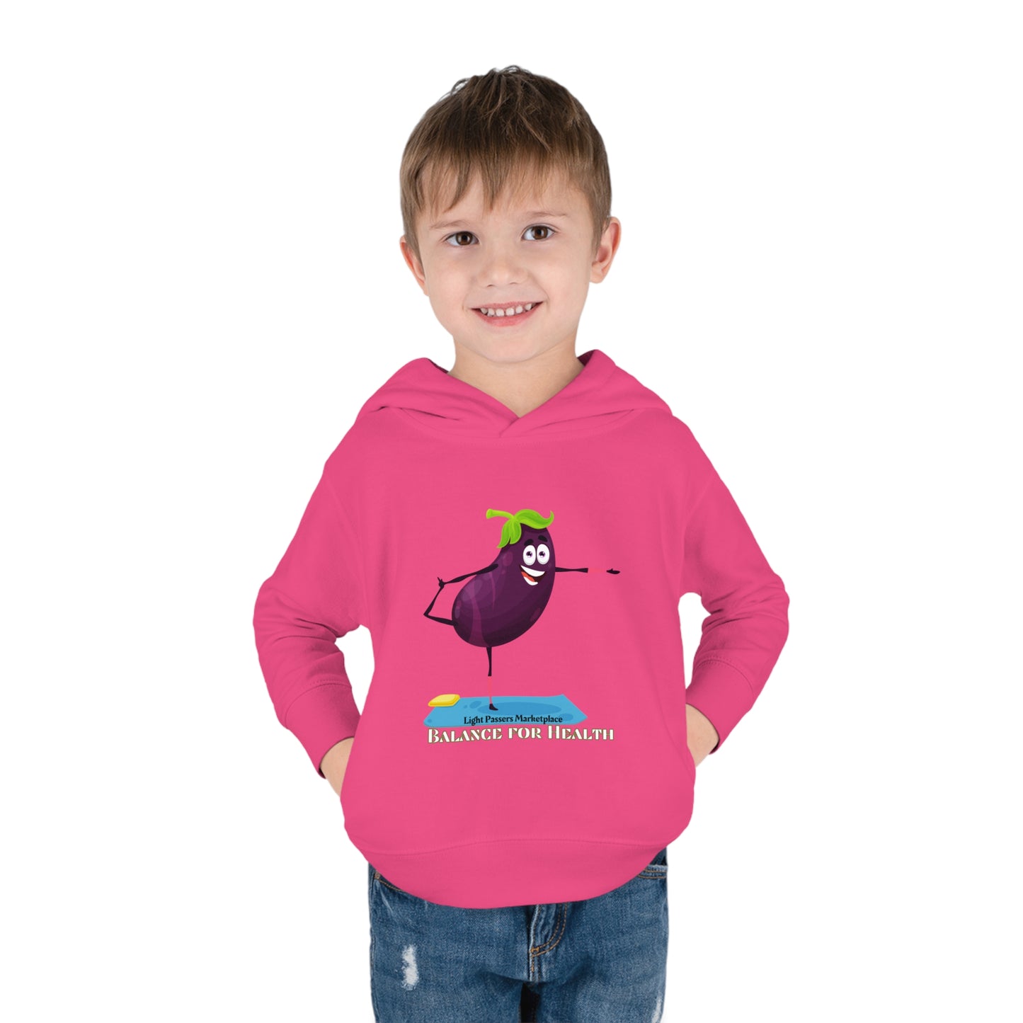 A toddler in a pink hoodie with a cartoon eggplant design, showcasing Rabbit Skins' durable, cozy features like side pockets and cover-stitched details.