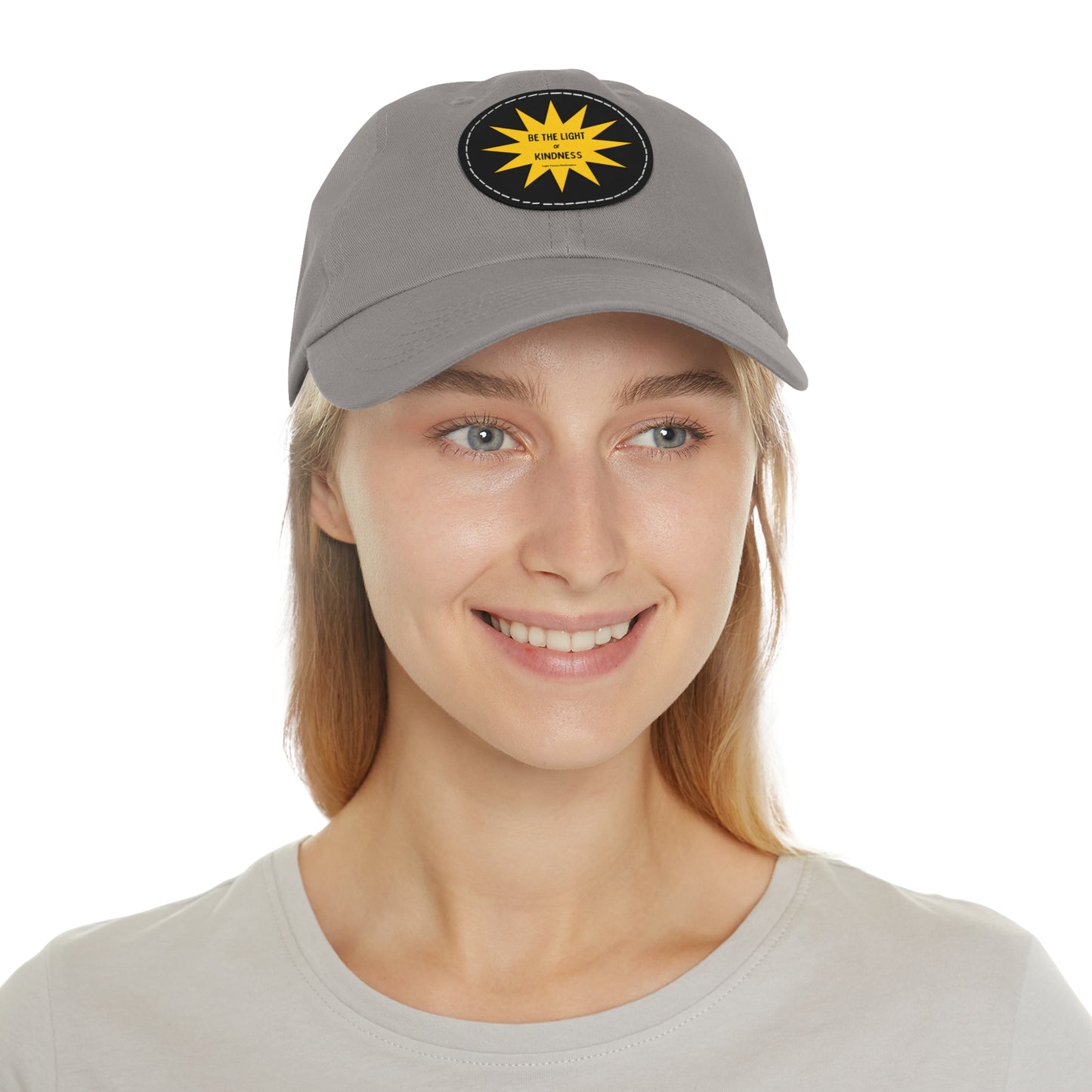 Unisex hat with 'Be the Light of Kindness' on a PU leather patch, featuring a buckle closure and chino twill fabric for a vintage look.
