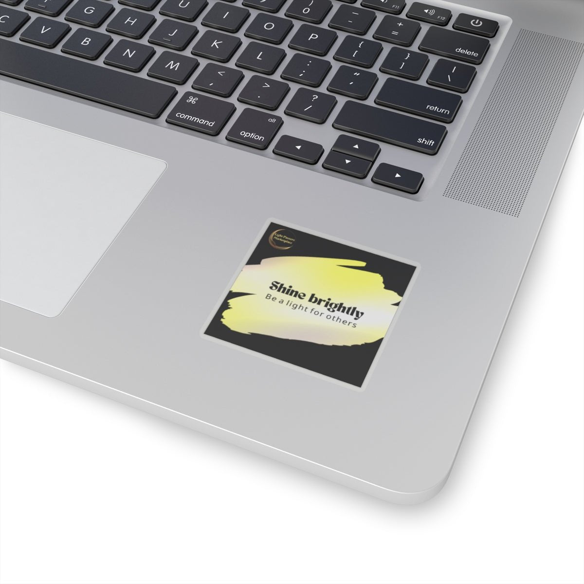 Inspirational Stickers - Put Shine Brightly for others Message Everywhere: A laptop adorned with a positivity-themed sticker, highlighting its glossy, scratch-resistant finish and vibrant design.