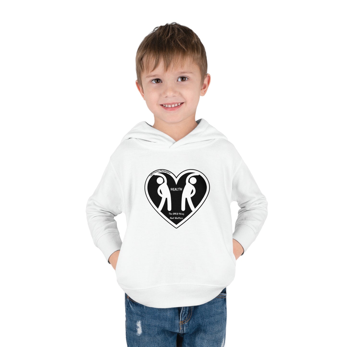 A boy in a toddler hoodie sweatshirt, hands in pockets. Close-up of fabric details like side-seam pockets and comfy 60% cotton, 40% polyester blend for playtime comfort.