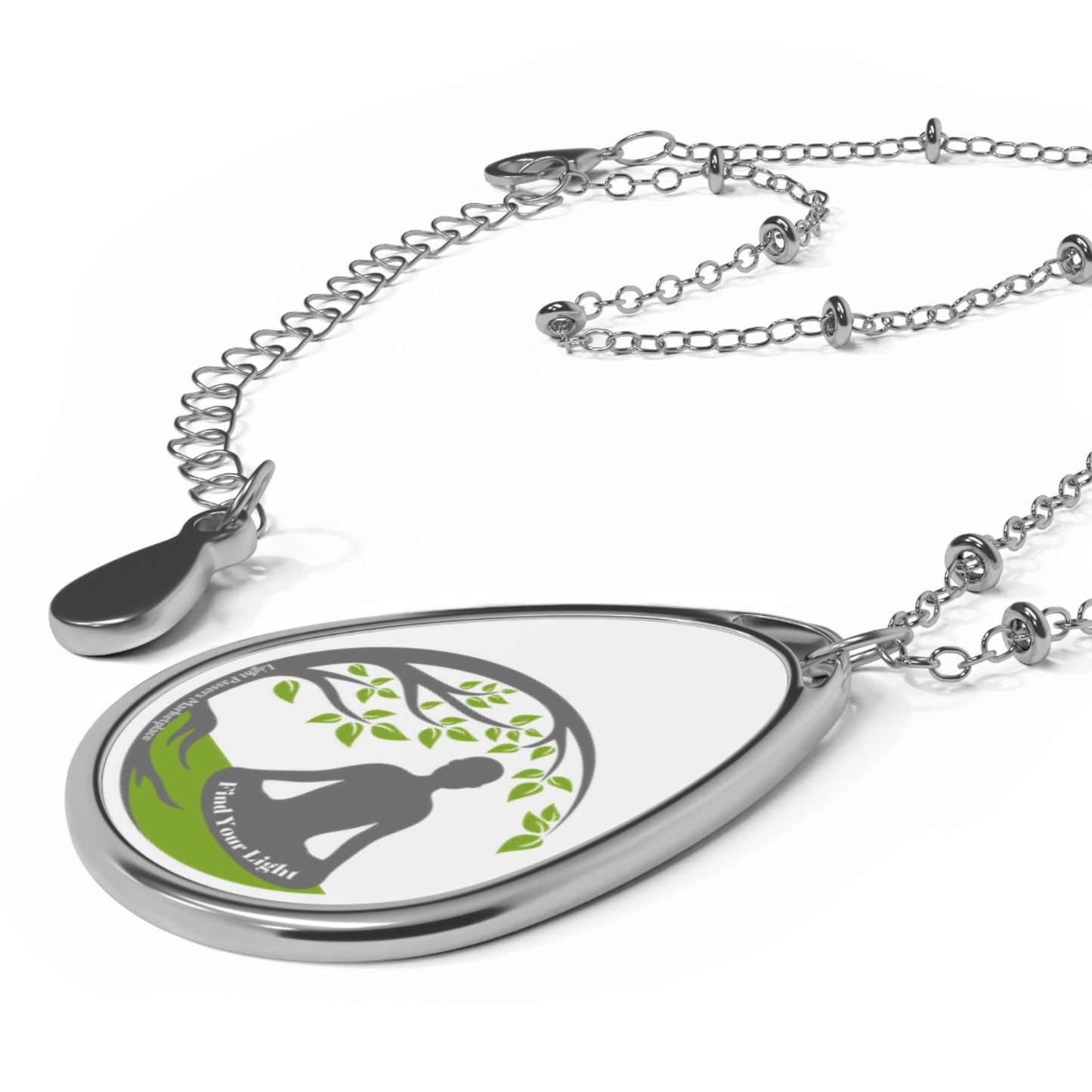 Silver chained necklace with oval pendant, featuring a robust zinc alloy chain and an aluminum print surface, ideal for personalized, long-lasting fashion accessories.
