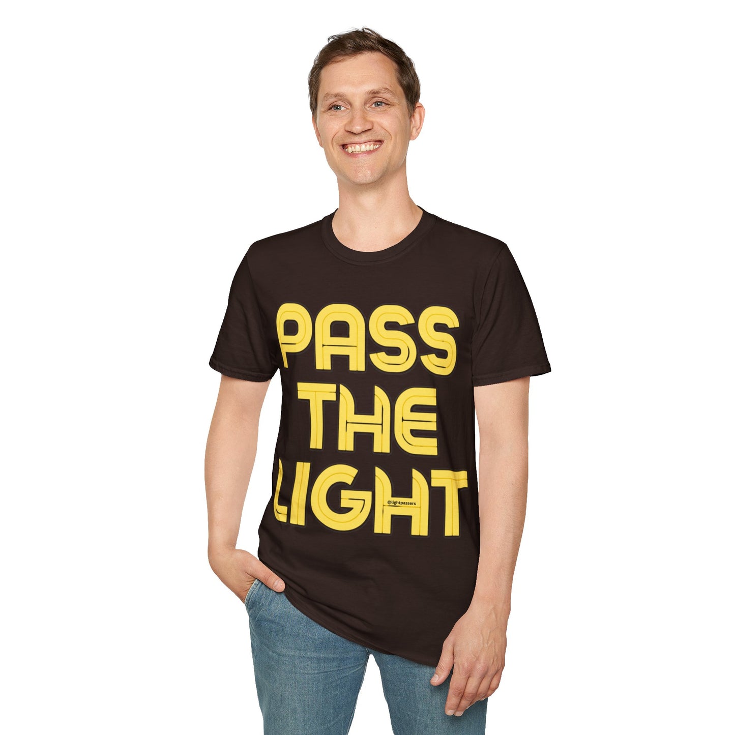 A smiling man in a black PASS THE LIGHT Unisex T-shirt with yellow text. Classic fit, 100% cotton tee without side seams for comfort.