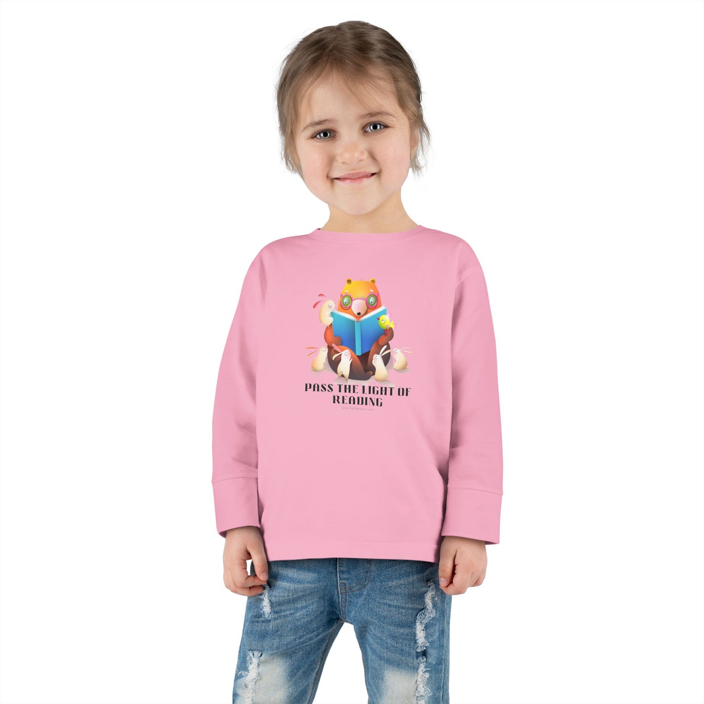 Toddler wearing the Pass the Light of Reading long-sleeve tee, featuring durable design details like ribbed collar and EasyTear™ label for comfort.
