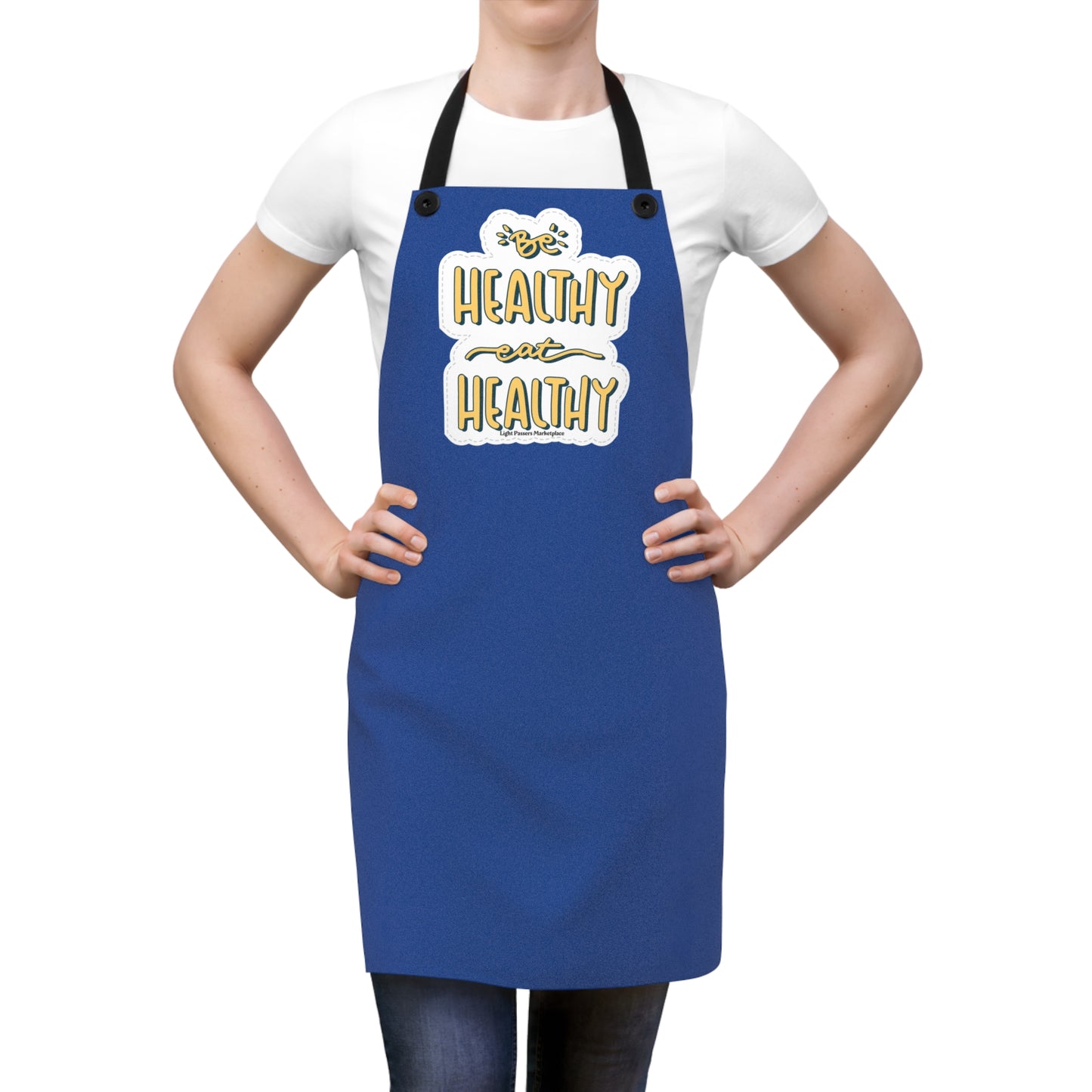 Woman wearing the Be Healthy Eat Healthy apron, ideal for kitchen use, featuring detachable straps and durable polyester fabric, perfect for gifting.
