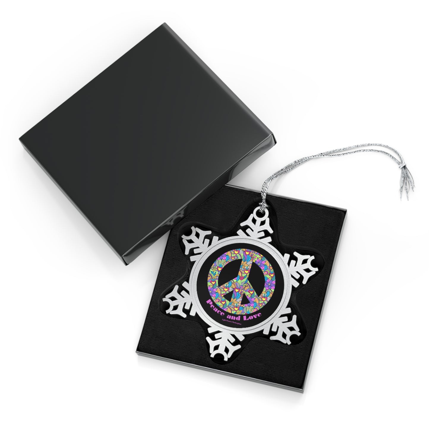 Peace pewter snowflake hanging decoration featuring a colorful flower peace sign, set in a black box. Ideal for home decor and celebrations.