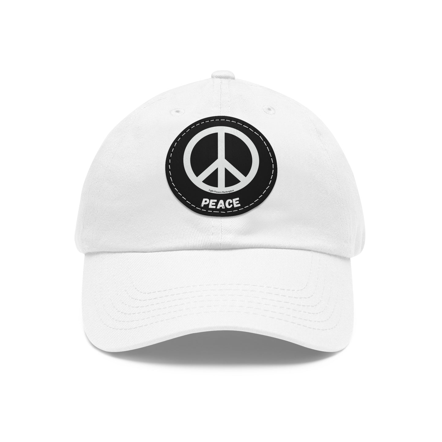 Unisex Hat with Leather Patch featuring a black and white Peace Symbol, made of bio-washed chino twill, unstructured, six-panel, low-profile design.