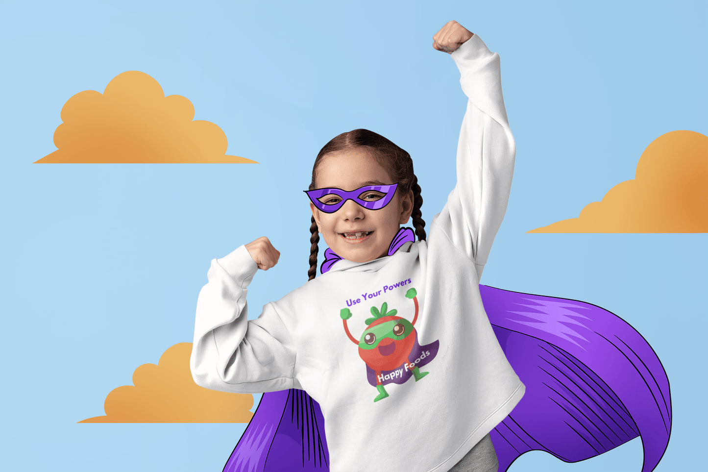 A toddler wearing a purple cape and mask, featuring a Tomato Power Toddler Hoodie with side seam pockets, jersey-lined hood, and durable construction for lasting coziness.