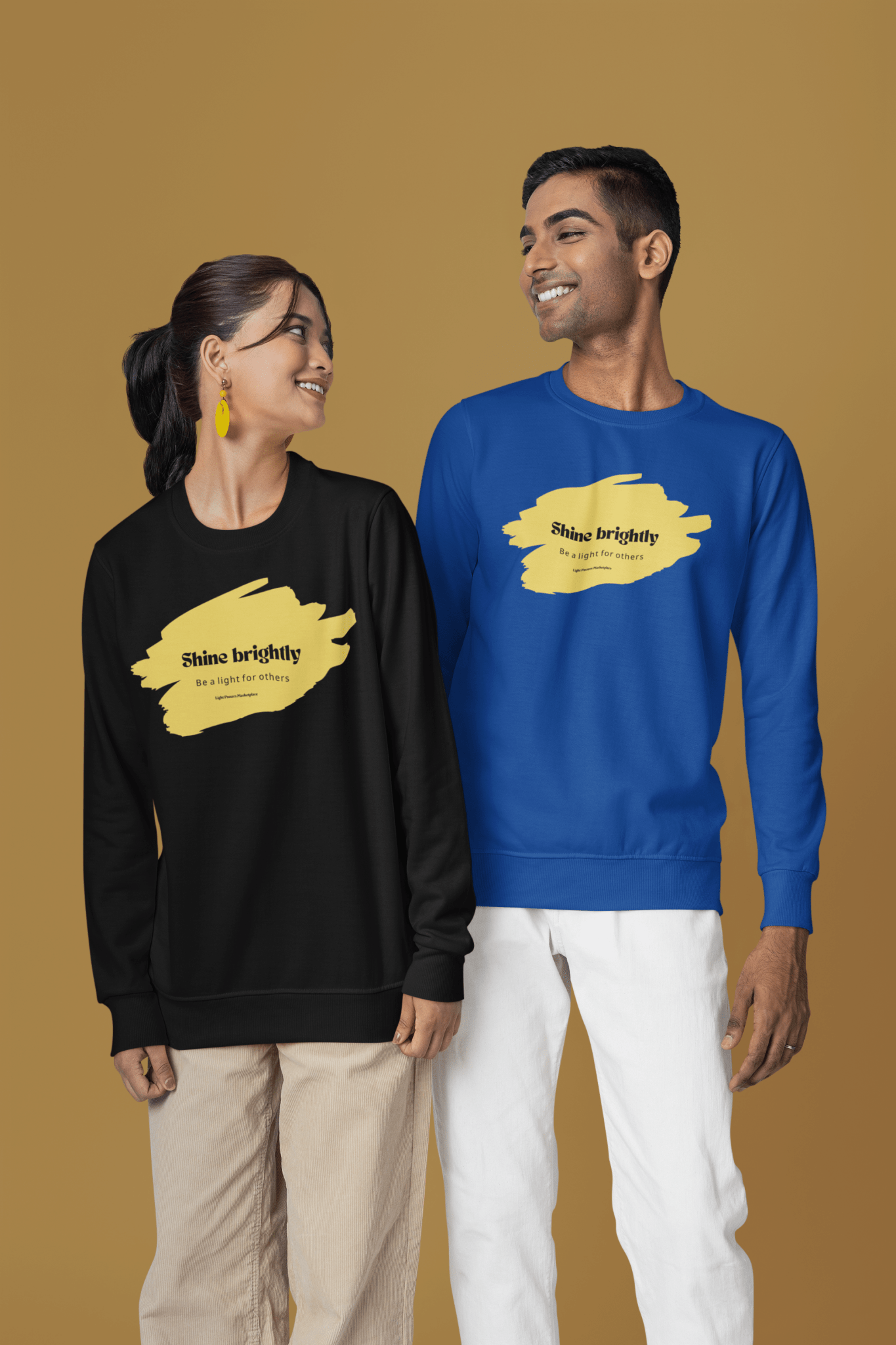 Man and woman wearing The Light Inspirational Crewneck Sweatshirt Adult Unisex, showcasing a cozy, positive message design perfect for spreading warmth and positivity.