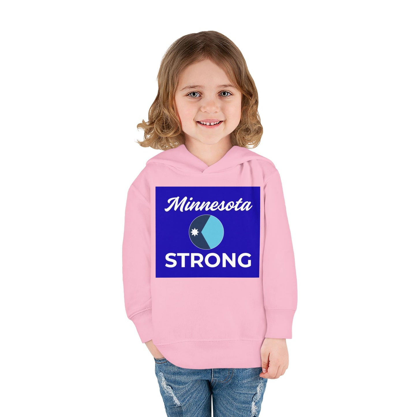 Toddler wearing Minnesota Strong hoodie, featuring blue graphic text, paired with jeans. Cozy, durable design ideal for playful, everyday wear.