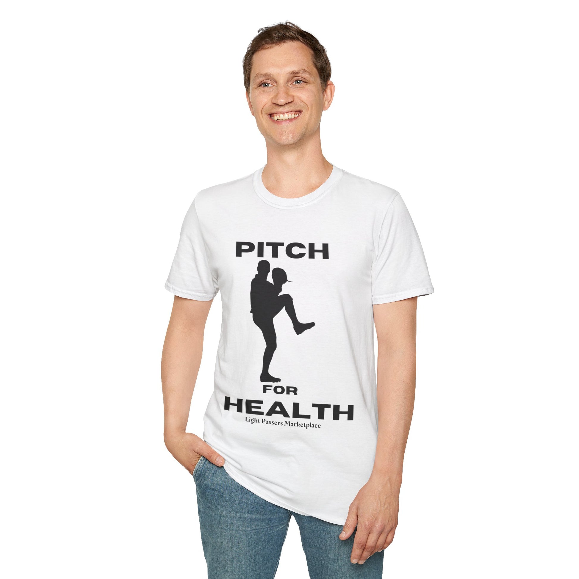 A man in a white Pitch for Health unisex t-shirt, featuring a black and white design, kicking. Made of soft 100% cotton with twill tape shoulders for durability. No side seams, ribbed collar.