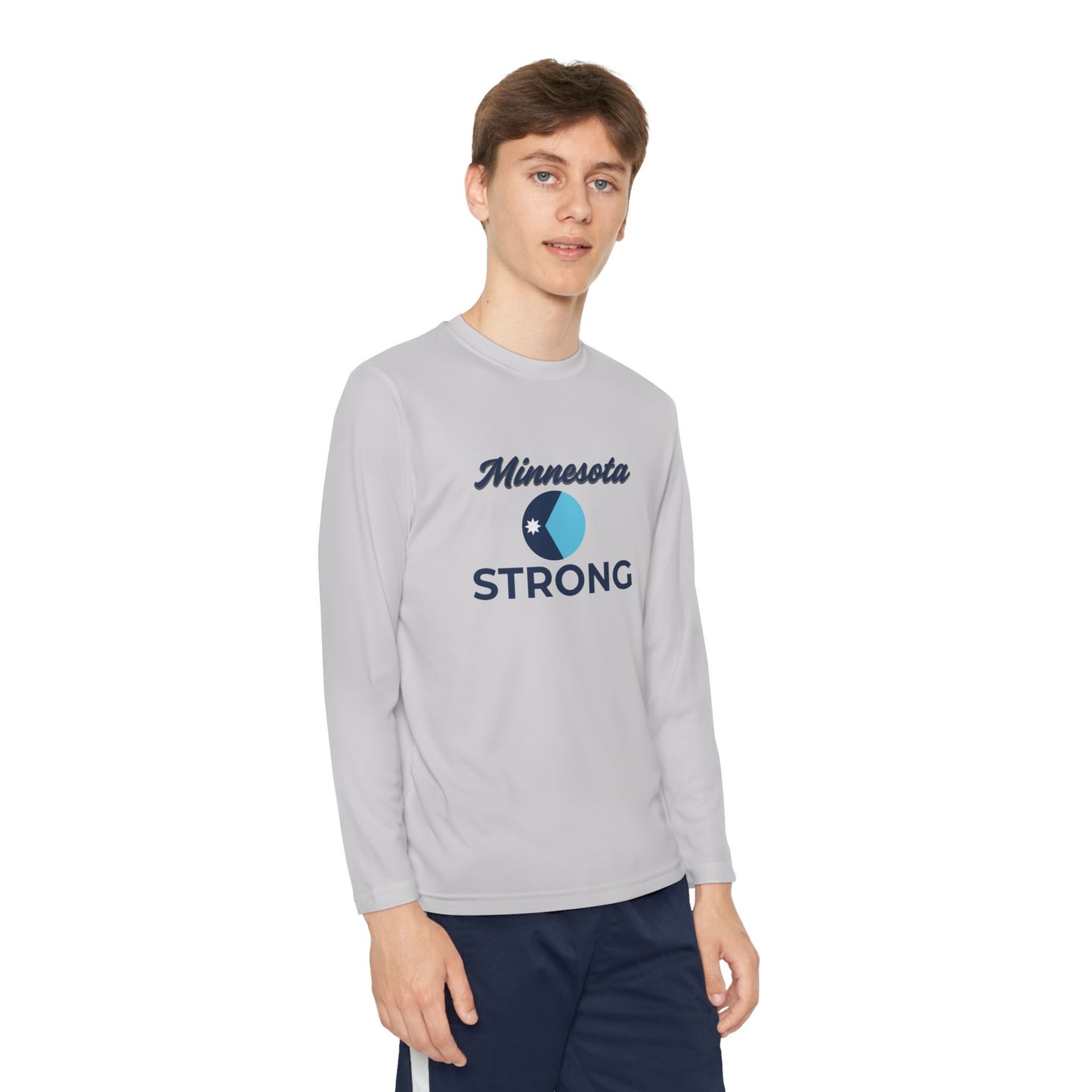Youth wearing Minnesota Strong long-sleeve tee, embodying civic courage with lightweight fabric for active wear.