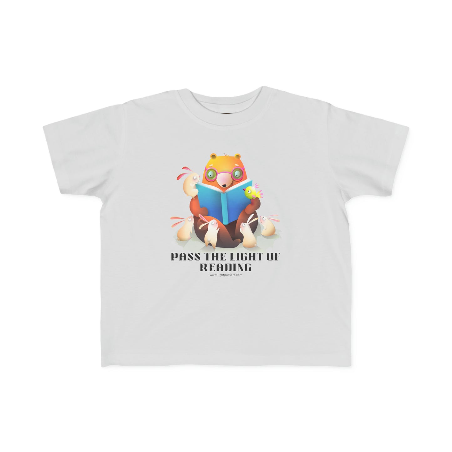 A Pass the Light of Reading Toddler T-shirt featuring a cartoon bear, bird, fox, and rabbit reading books. Made of 100% combed cotton, light fabric, tear-away label, and a classic fit.