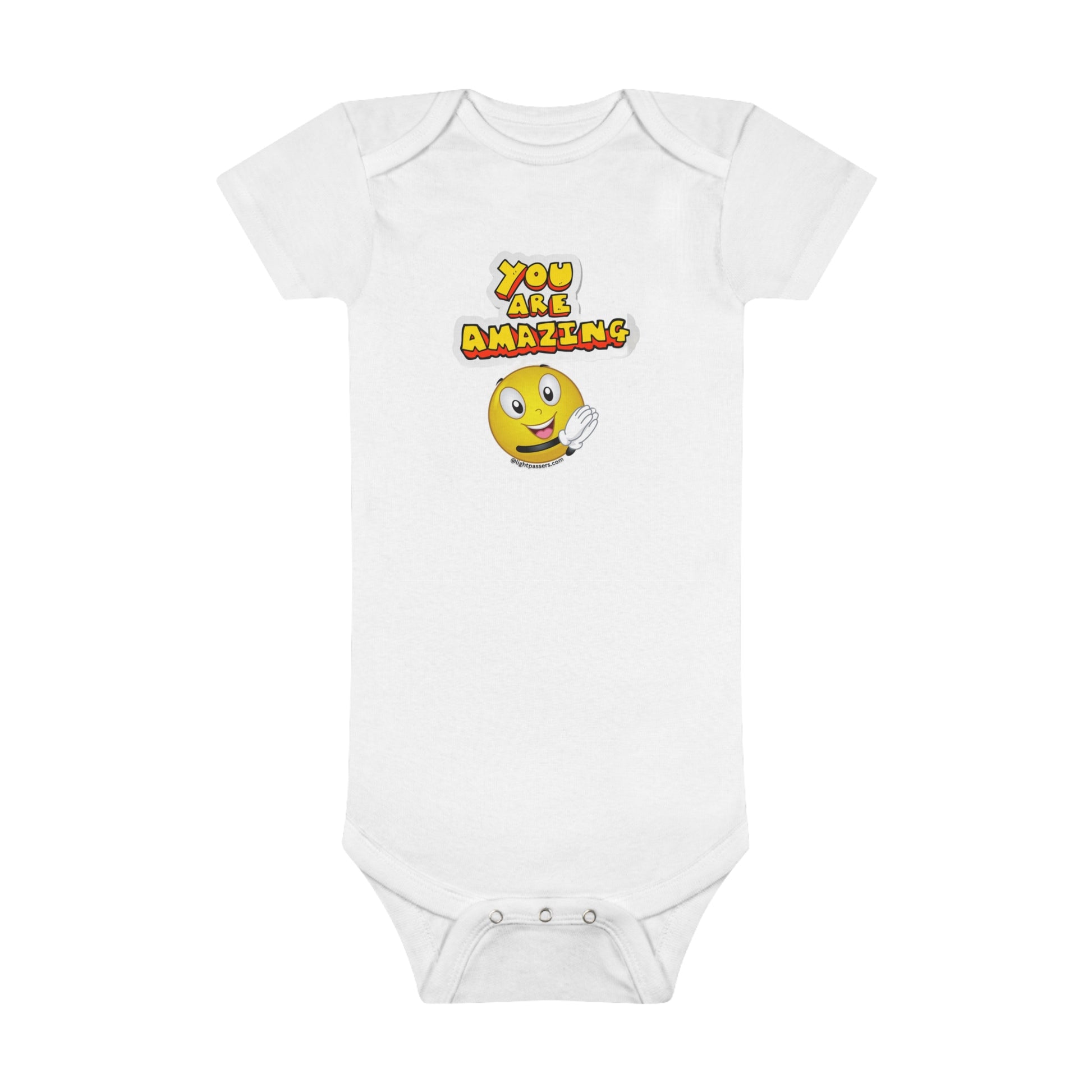 Organic white baby Onesie® featuring a smiley face, waving cartoon character, and yellow/red text. Made from 100% OEKO-TEX® certified cotton for softness and breathability. Includes bottom snap closure and lap shoulder neckline.