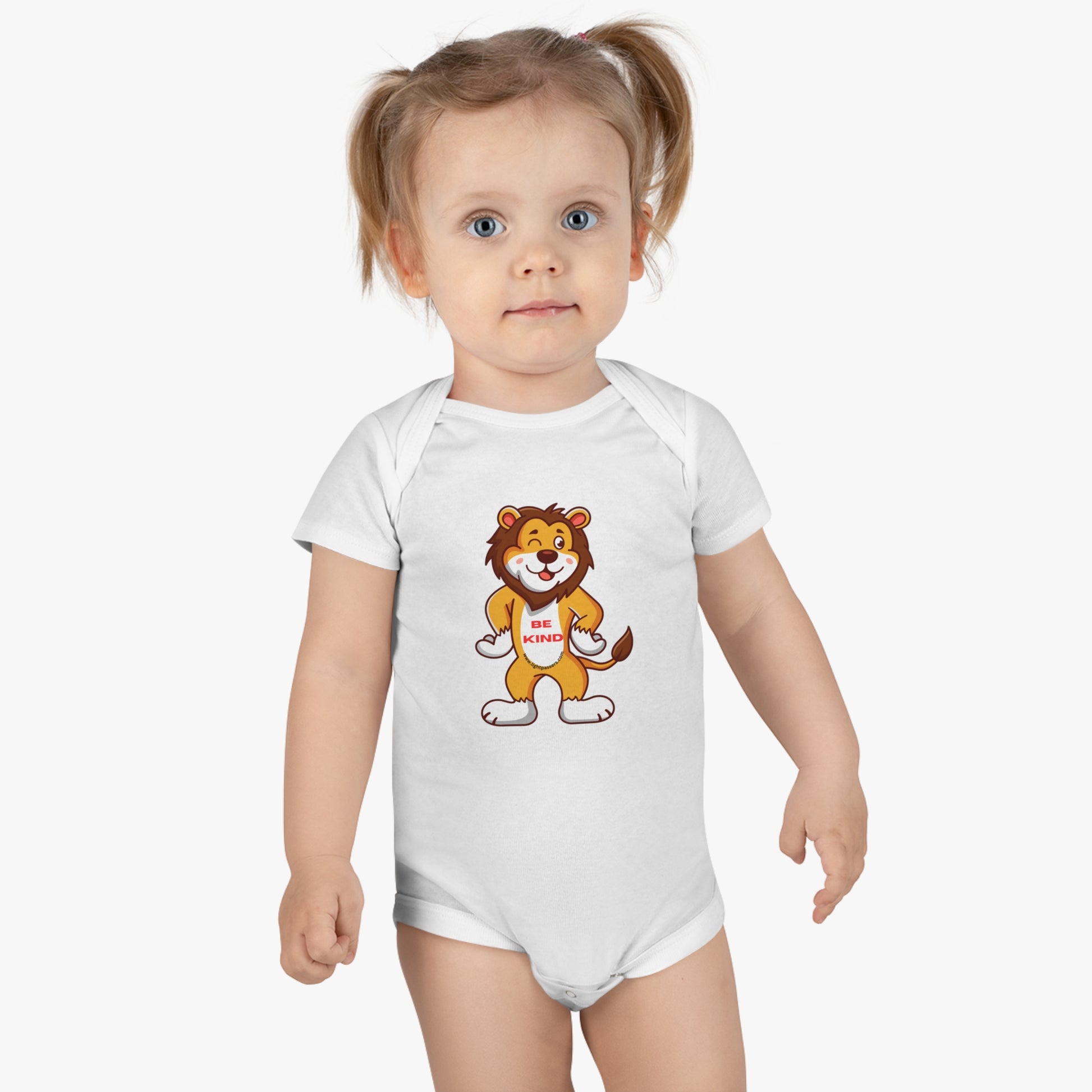 Organic white baby Onesie featuring a smiling lion cartoon. Made of 100% rib cotton with bottom snap closure, OEKO-TEX® certified for softness and durability. Ribbed legs for secure fit.