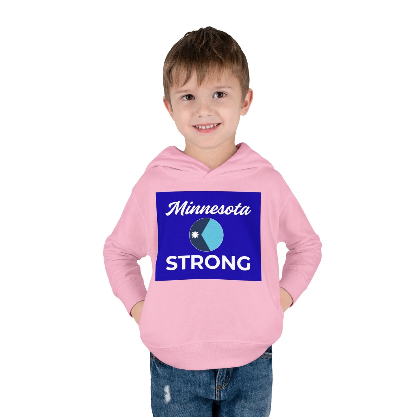 Toddler in light-pink Minnesota Strong hoodie with blue emblem, showcasing state pride; features cozy fleece, ribbed cuffs, and side pockets.
