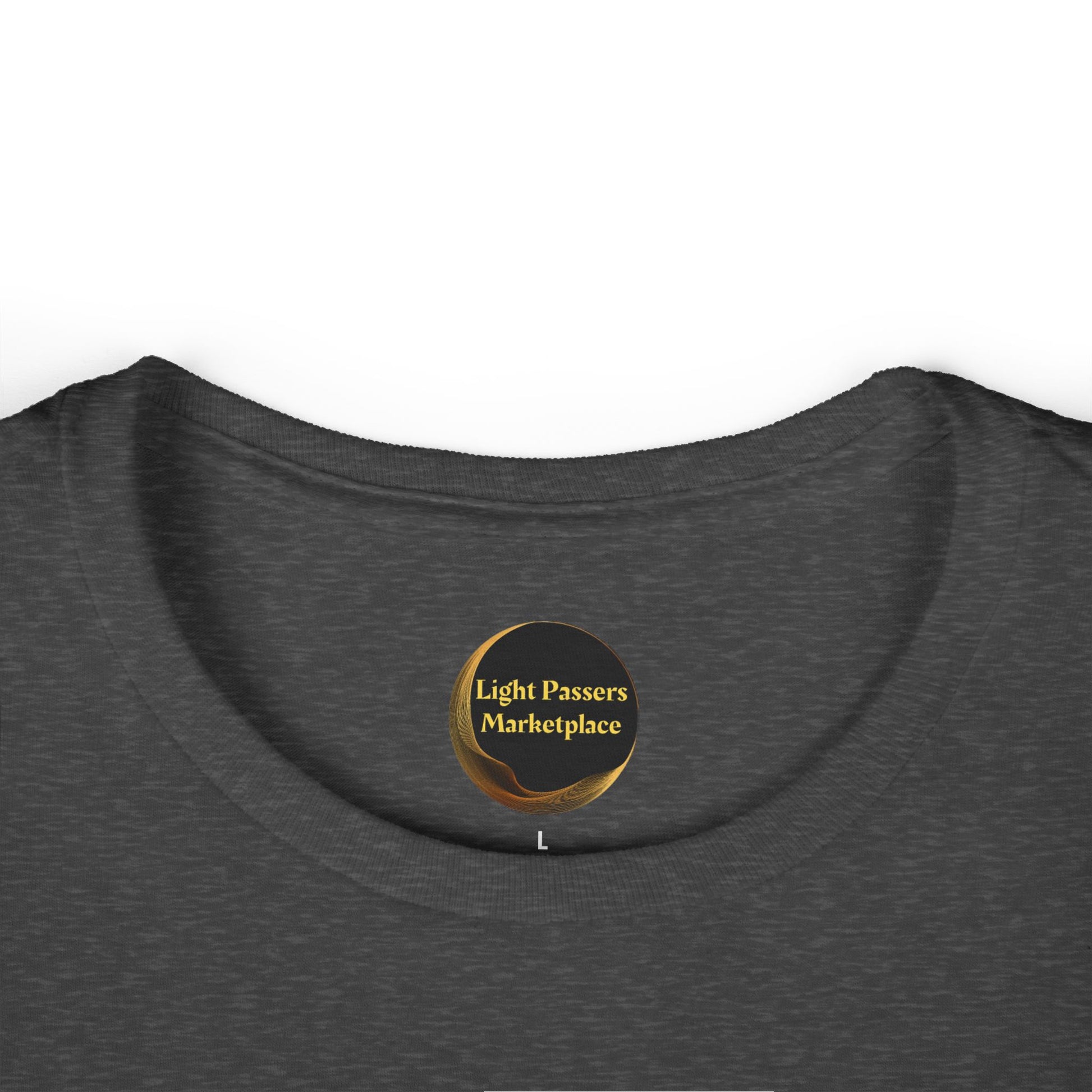 Close-up of the Women's Tee - Magical Unicorn Stretch for Health, featuring Light Passers Marketplace logo and size L printed inside the neckline.