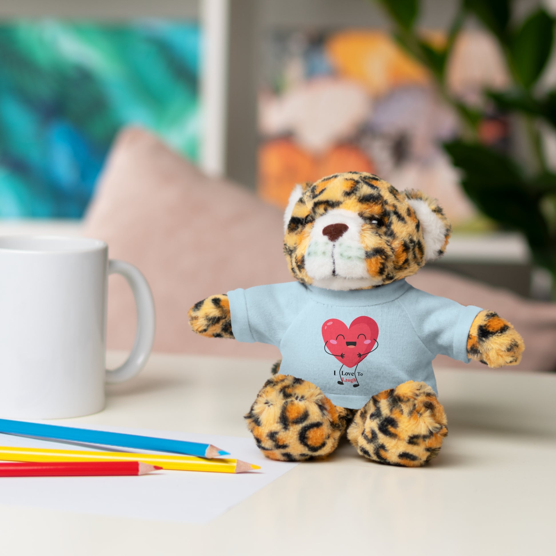 Stuffed animal with a removable I Love to Laugh shirt, available in Bear, Sheep, Bunny, Jaguar, Panda, or Lion, perfect for gifting and cuddling.