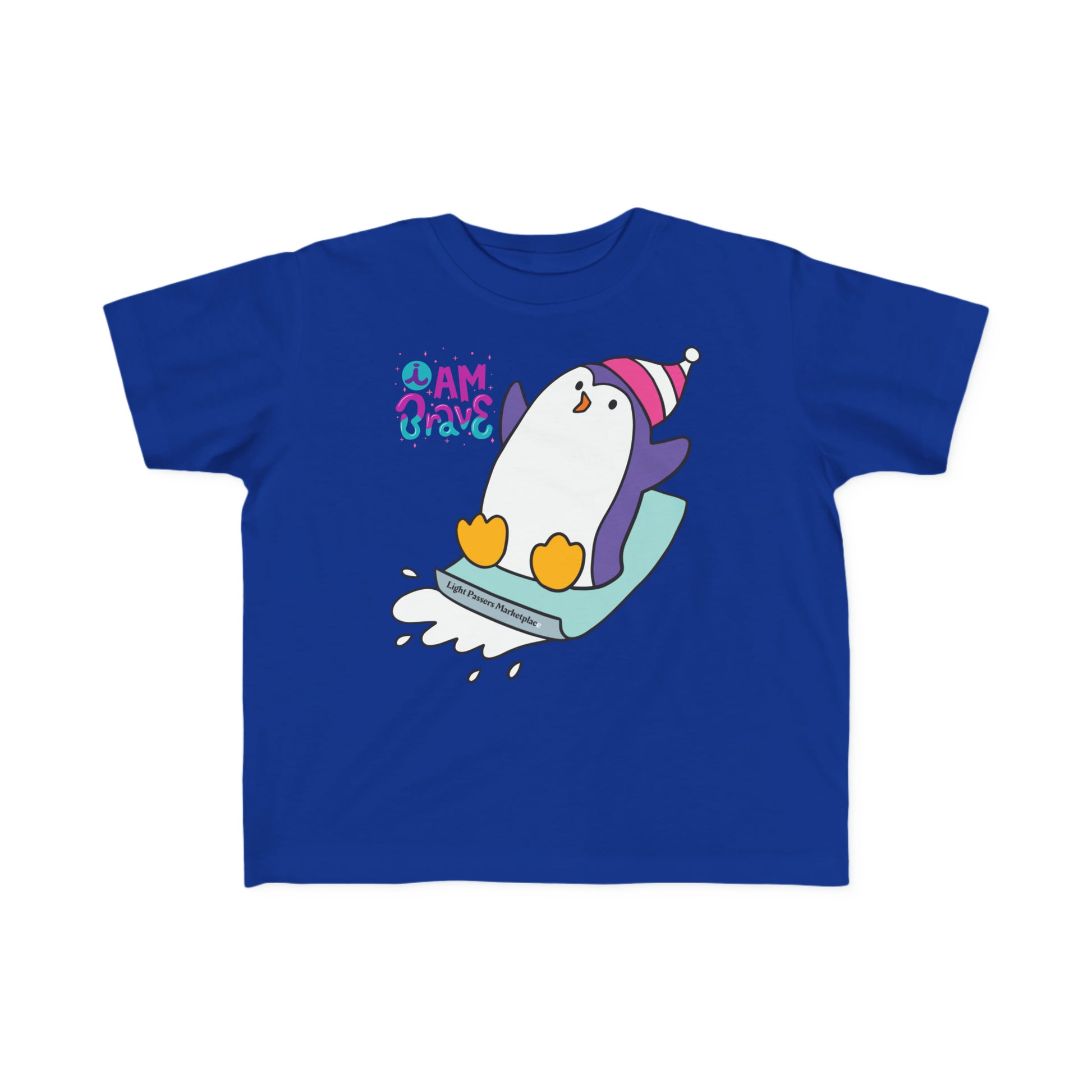 A Brave Penguin Toddler T-shirt featuring a cartoon penguin design on a blue shirt. Made of soft, durable 100% combed cotton with a tear-away label. Ideal for sensitive skin.