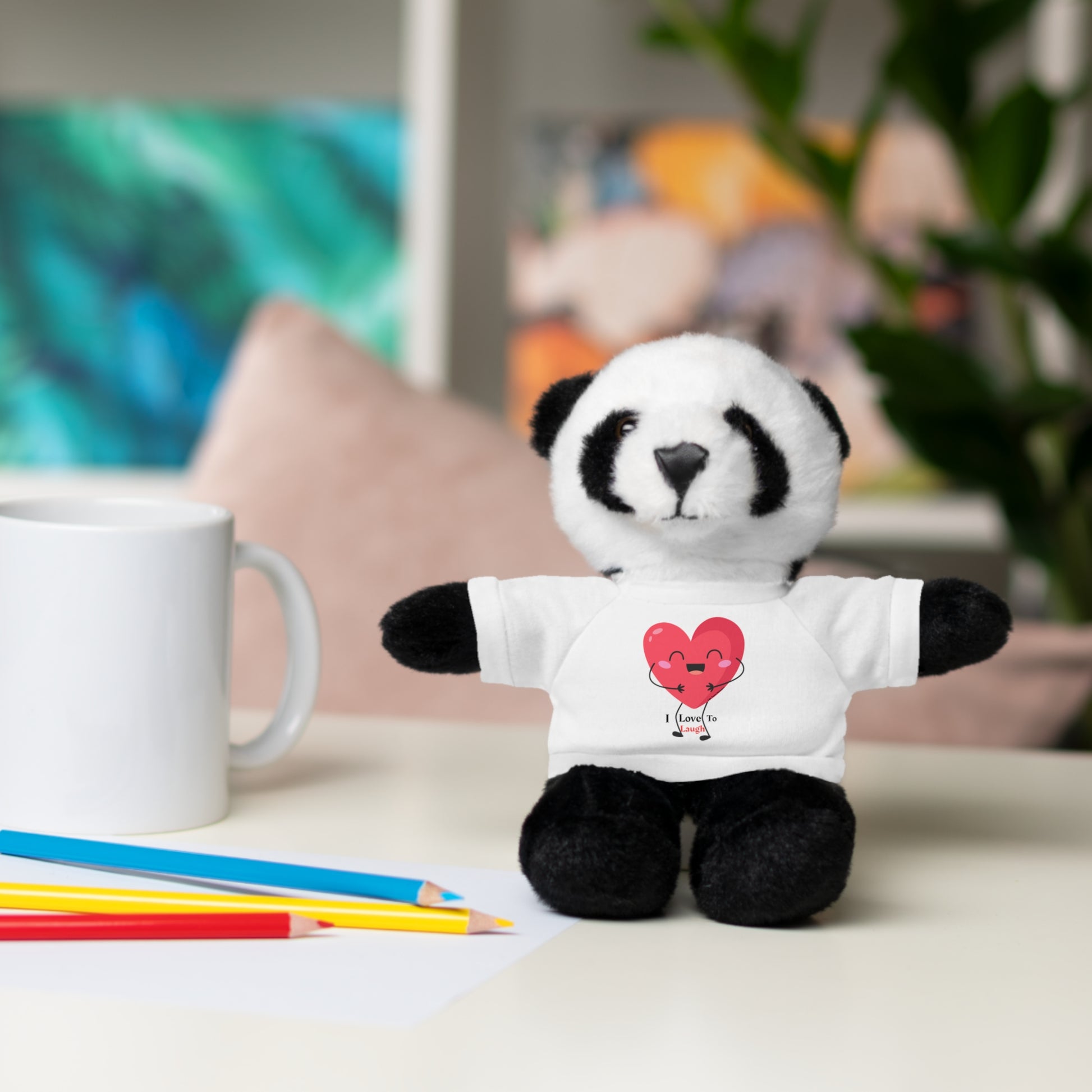 Cool Stuff Stuffies: choice of six plush animals with customizable I Love to Laugh shirts, promoting joy and companionship for children aged 3 and up.