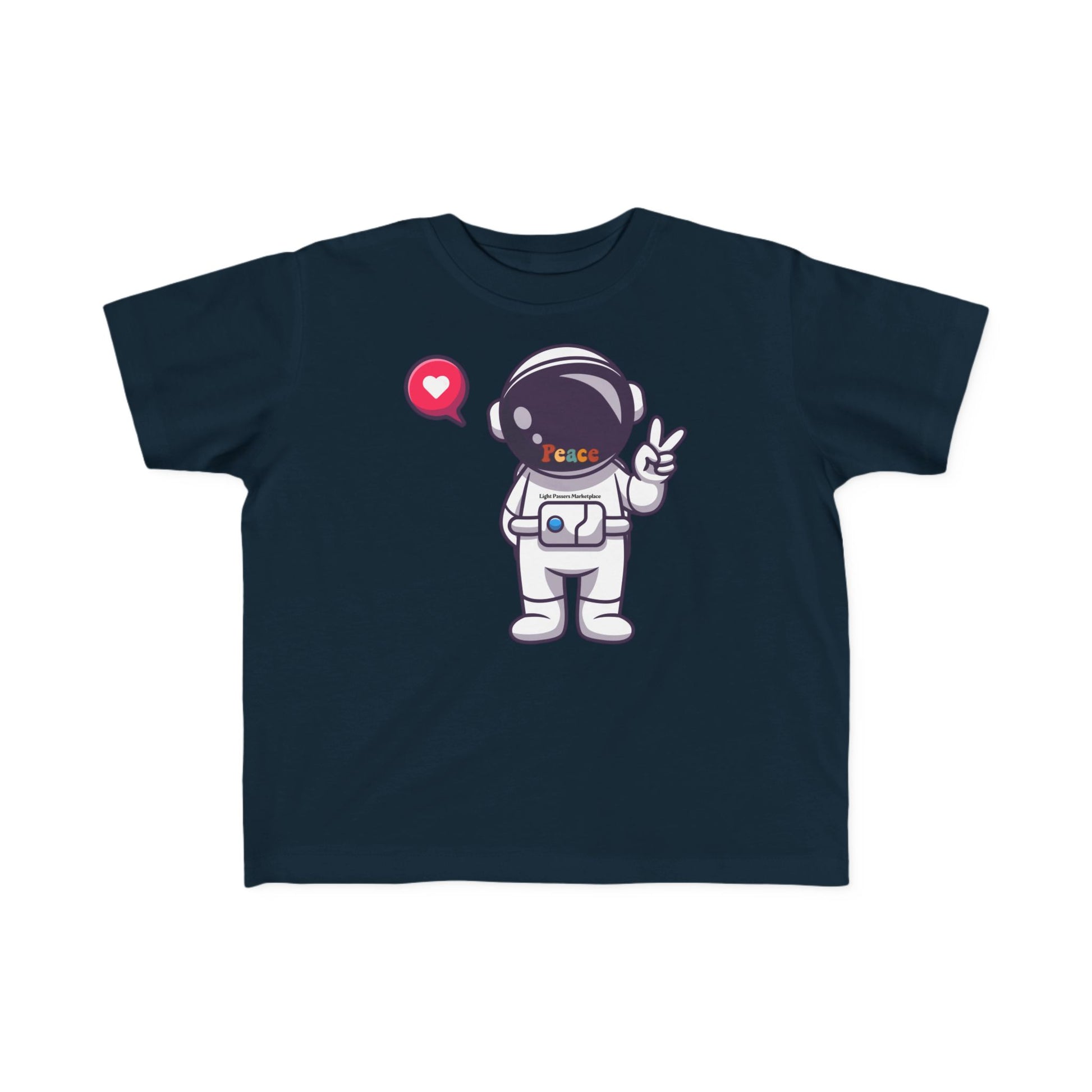 Peace Astronaut Toddler T-shirt featuring a cute astronaut with a Peace visor, peace sign, heart bubble, and Light Passers Marketplace label, perfect for sensitive skin.