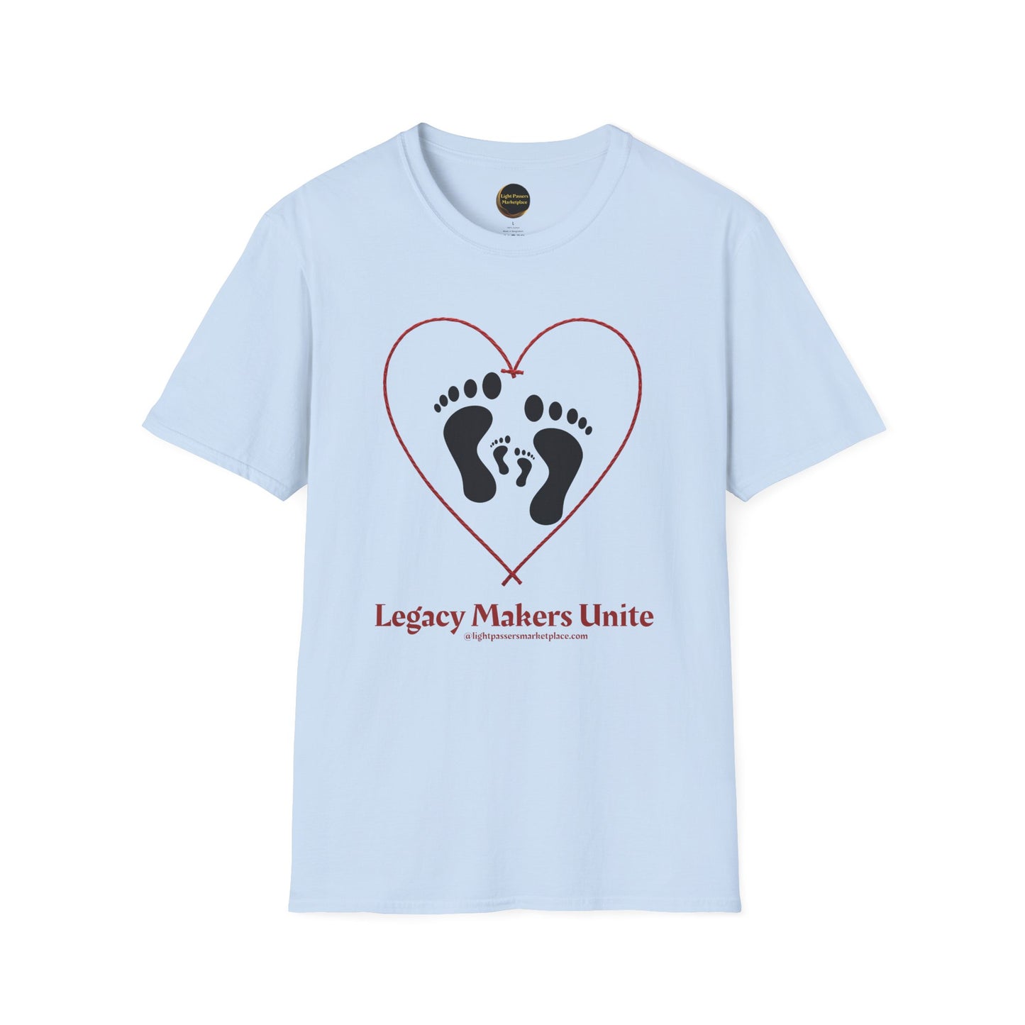 Light-blue T-shirt with a red heart graphic enclosing footprints and Legacy Makers Unite slogan, promoting unity and sustainability. Ideal for those valuing ethical production.