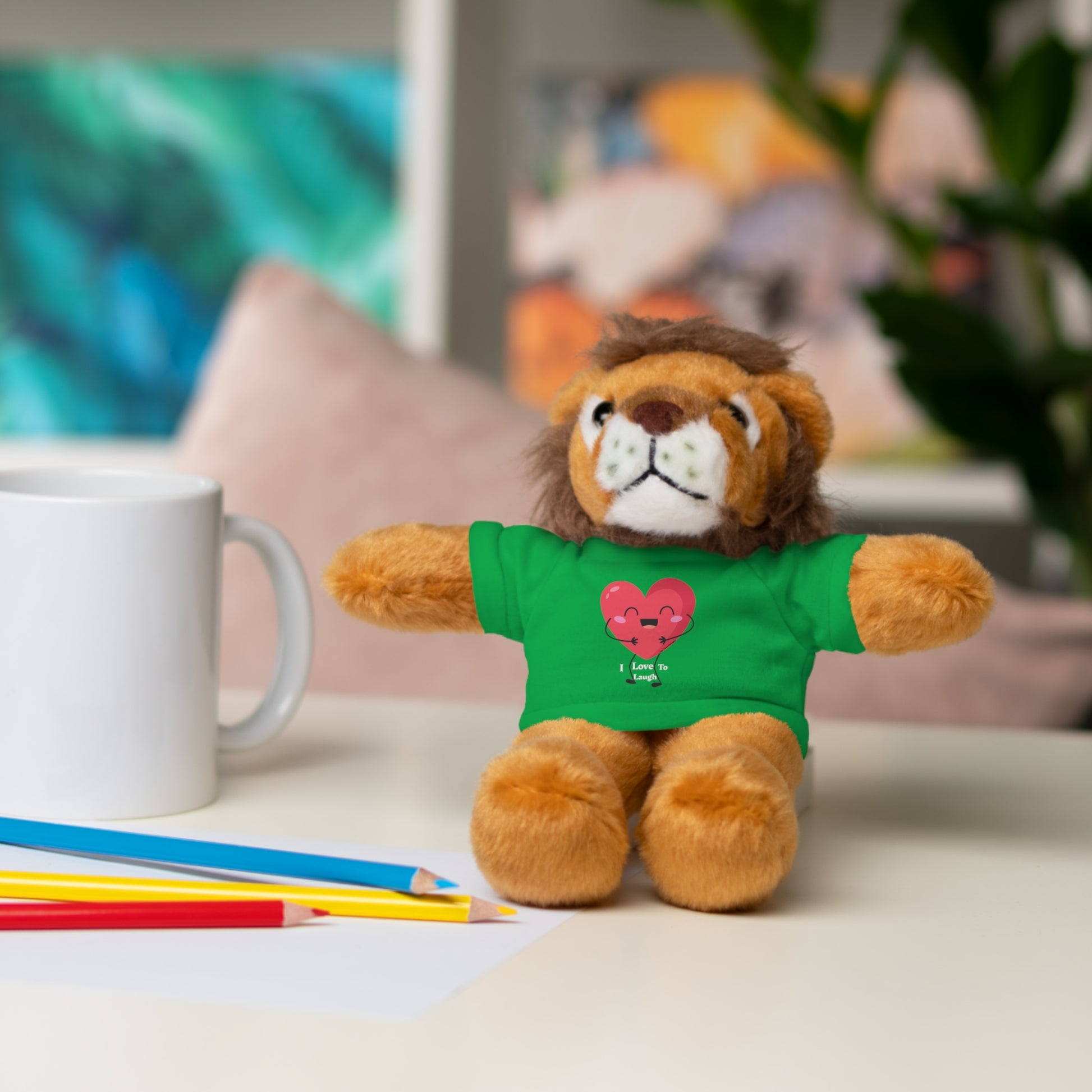 Stuffed animal with a removable I Love to Laugh heart t-shirt, from Cool Stuff Stuffies, available in six animal options, perfect for gifting and cuddling.