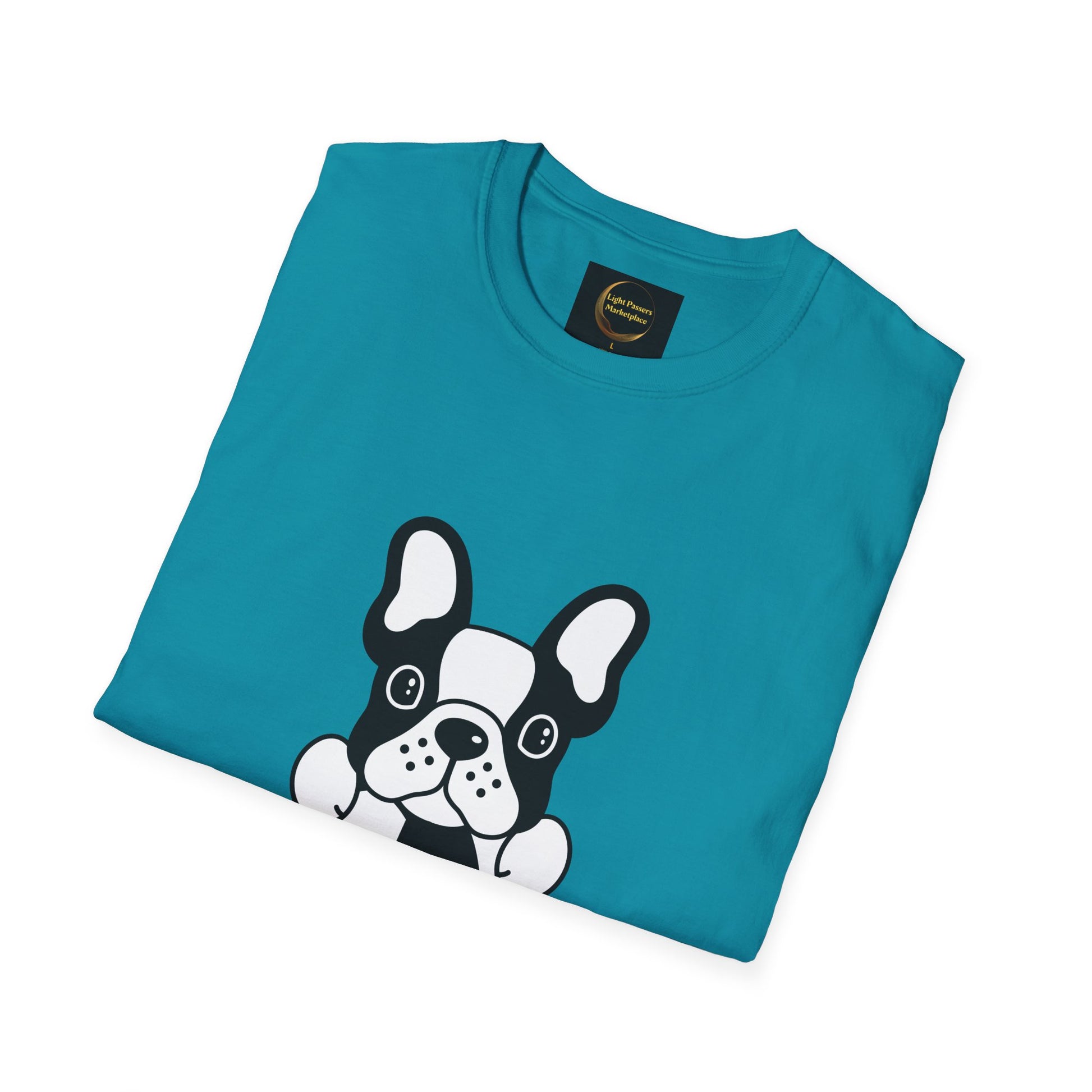 Soccer Dog Unisex T-Shirt, featuring a cartoon French bulldog face, folded with visible Light Passers Marketplace label, highlighting casual comfort and ethical production.
