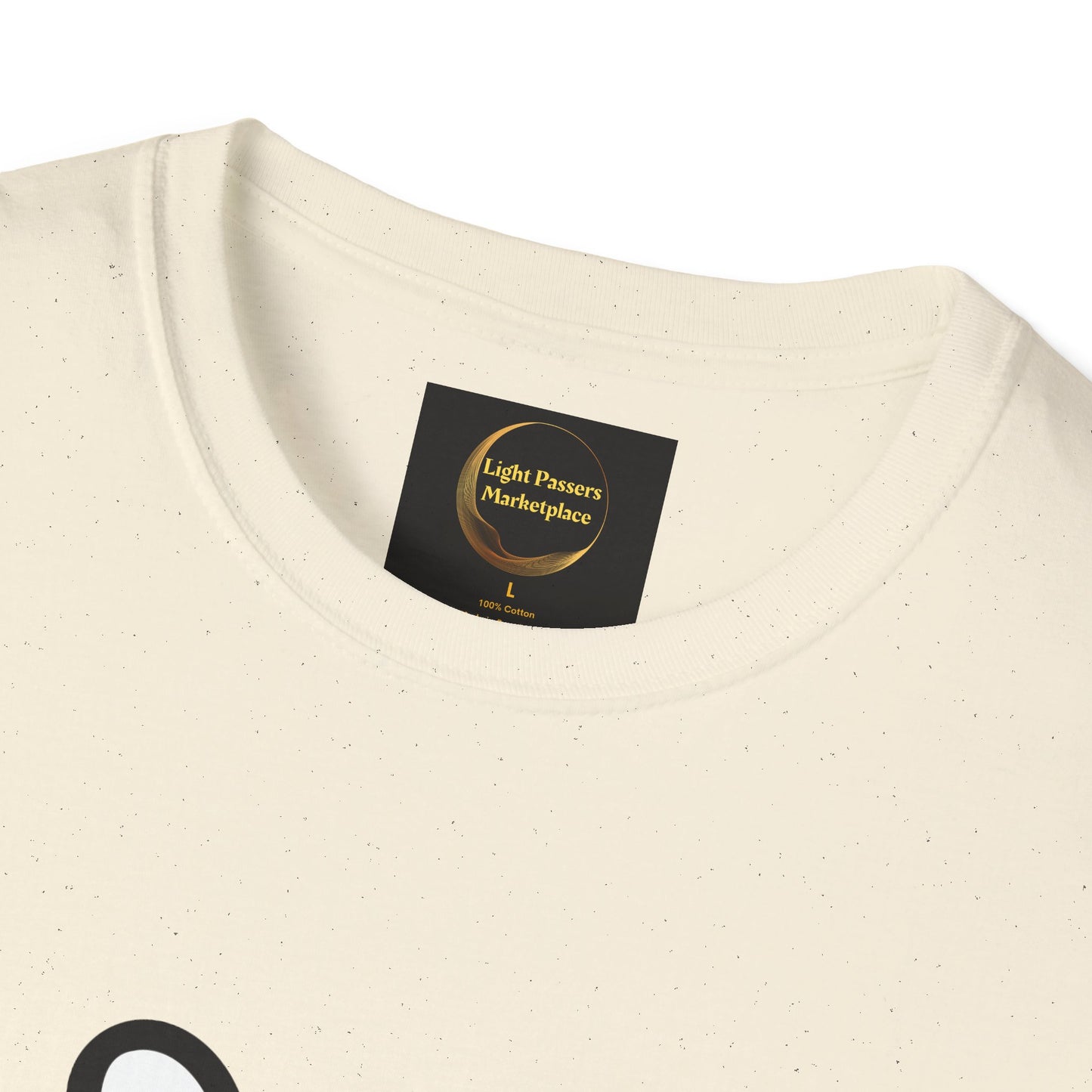 Close-up of Soccer Dog Unisex T-Shirt neckline, featuring a black label with Light Passers Marketplace, size large, and 100% cotton details.