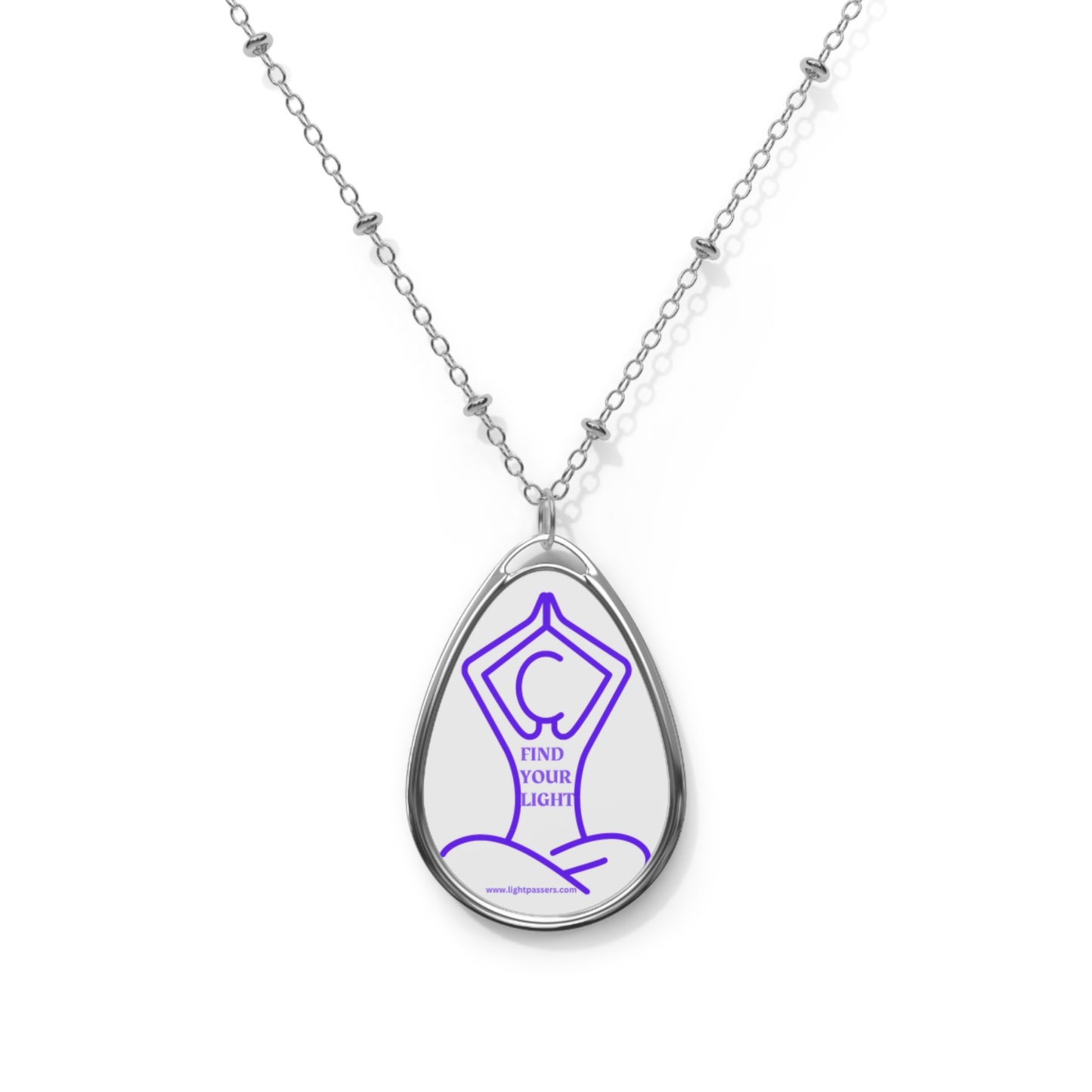 Silver necklace with an ellipse-shaped pendant showing a person in a yoga pose, inscribed with 'Find Your Light'. Ideal for yoga enthusiasts.