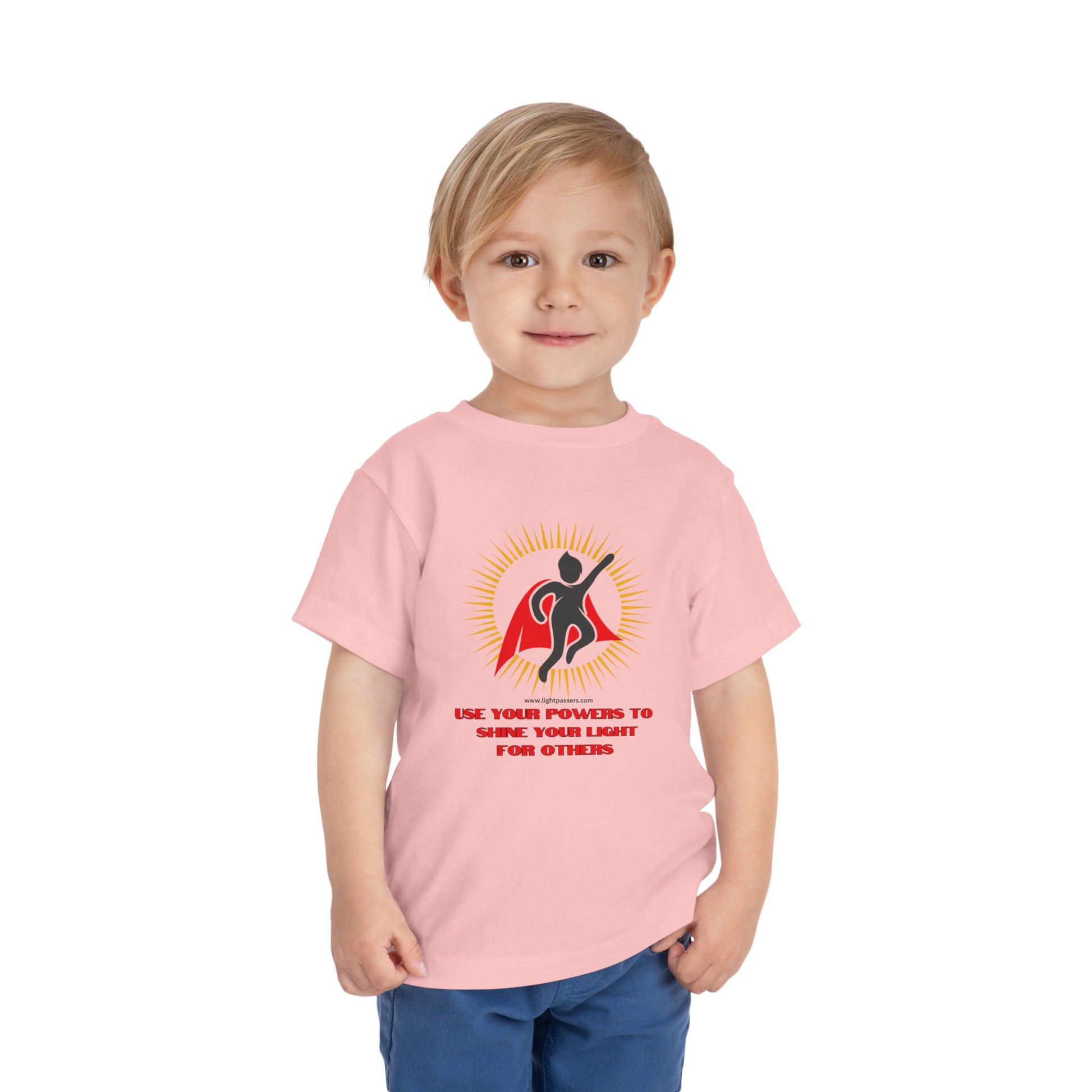 A toddler wearing a Use Your Powers custom t-shirt by Bella Canvas. 100% Airlume combed cotton, tear-away label for comfort. Ideal for daily wear.