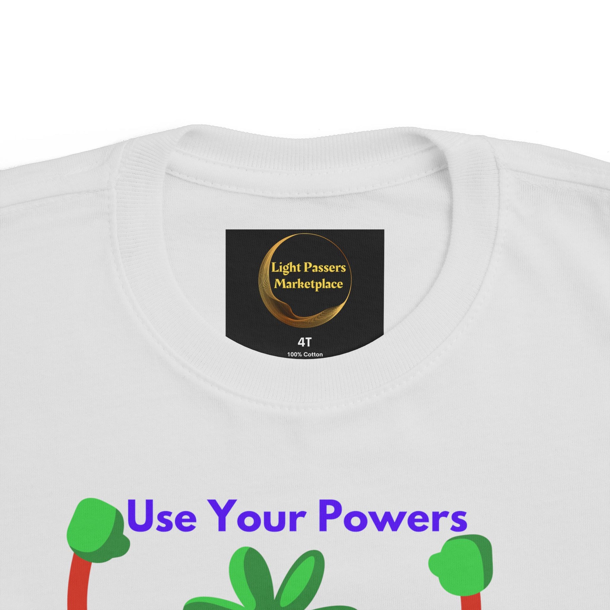 Health Tomato Power Toddler T-shirt featuring Use Your Powers in purple above green plant-like shapes, showcasing softness and durability for sensitive skin.