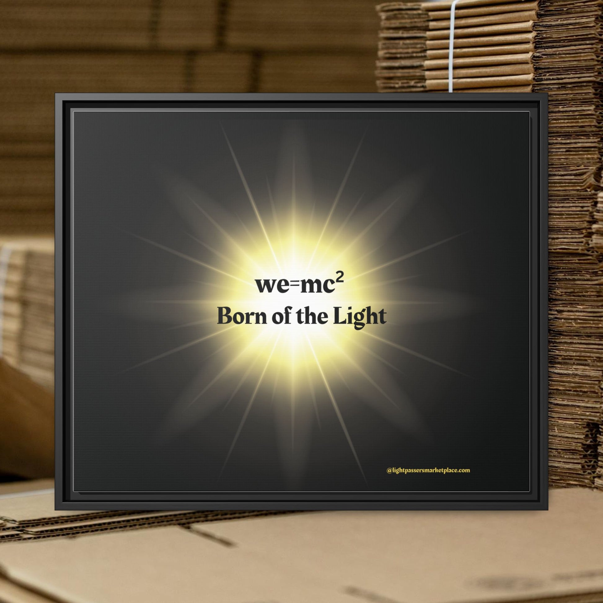 Inspirational Framed Canvas Art - we=mc² Born of the Light, featuring a black square frame with yellow light, ideal for inspiring creativity in any space.