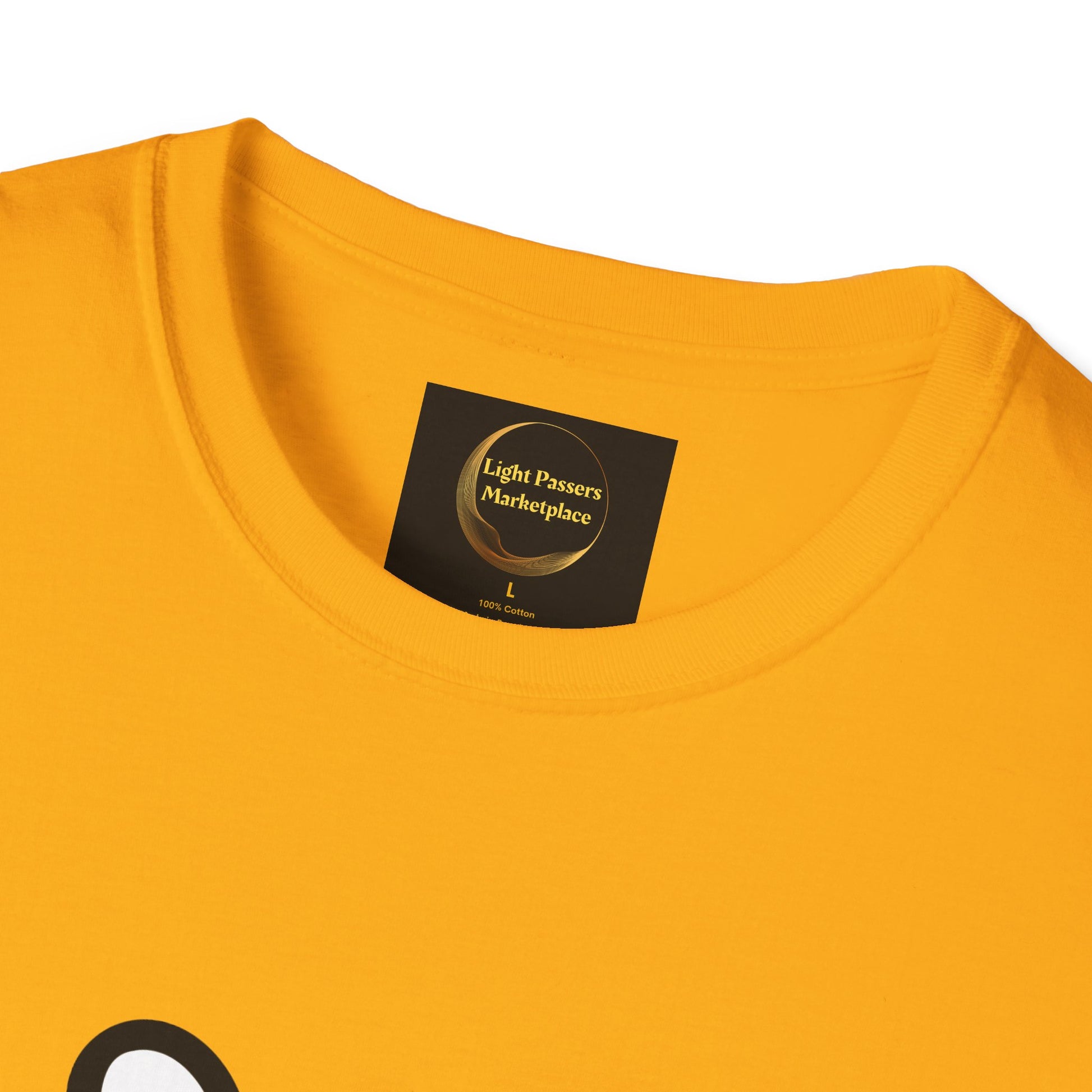 Close-up of Soccer Dog Unisex T-Shirt's neckline, showcasing the black “Light Passers Marketplace” label on a soft, 100% cotton fabric with a hint of design visible.
