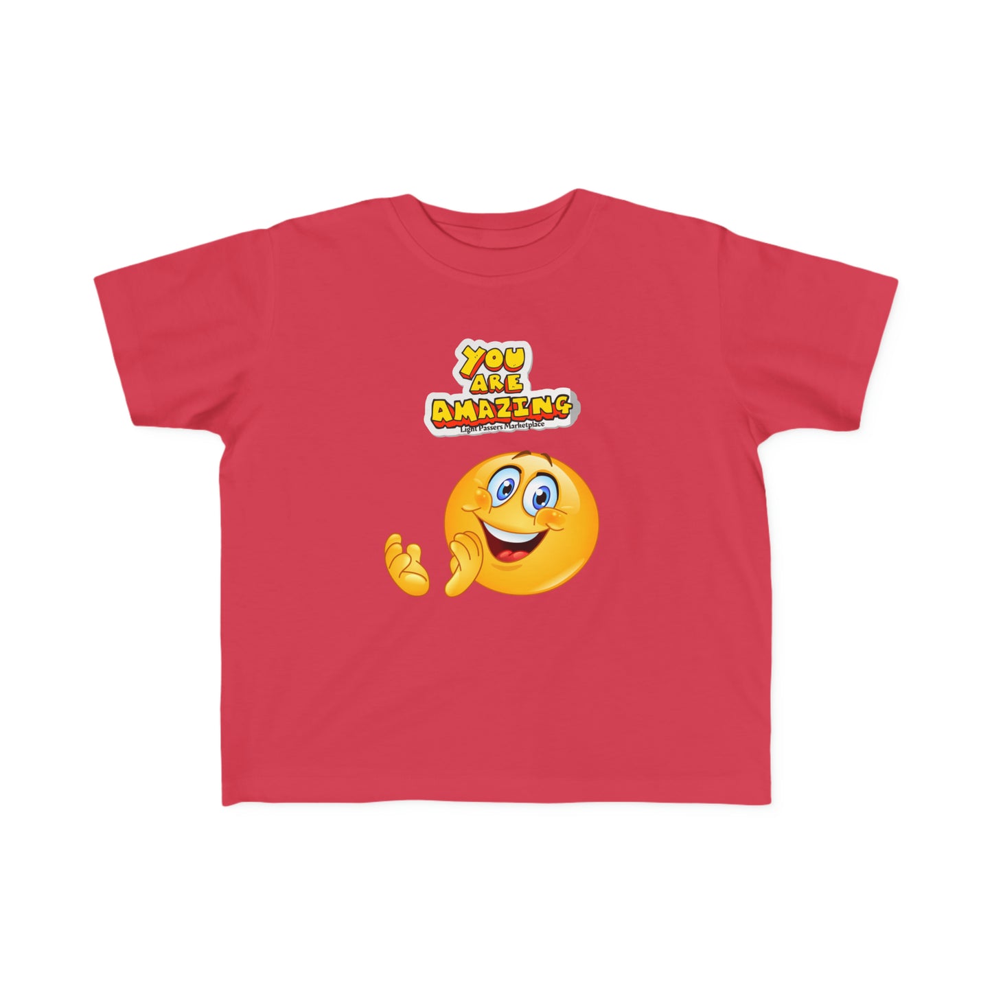A toddler's red tee featuring a cartoon face, embodying the You are Amazing Toddler T-shirt. Soft 100% combed cotton, durable print, tear-away label, and a classic fit for comfort.