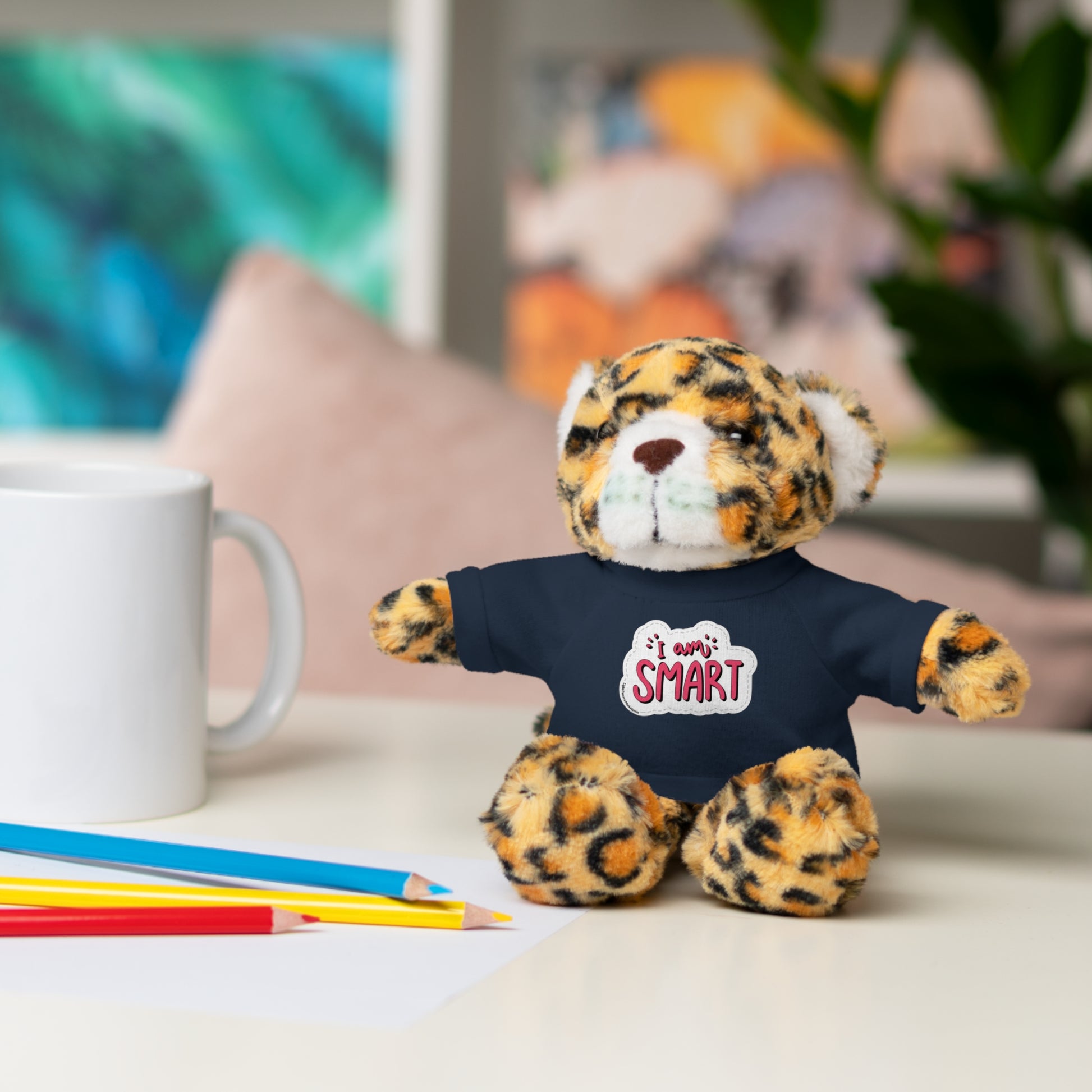 Plushies featuring six animals, each wearing a T-shirt with 'I am Smart' message, from Light Passers Marketplace. Perfect educational gift for kids.
