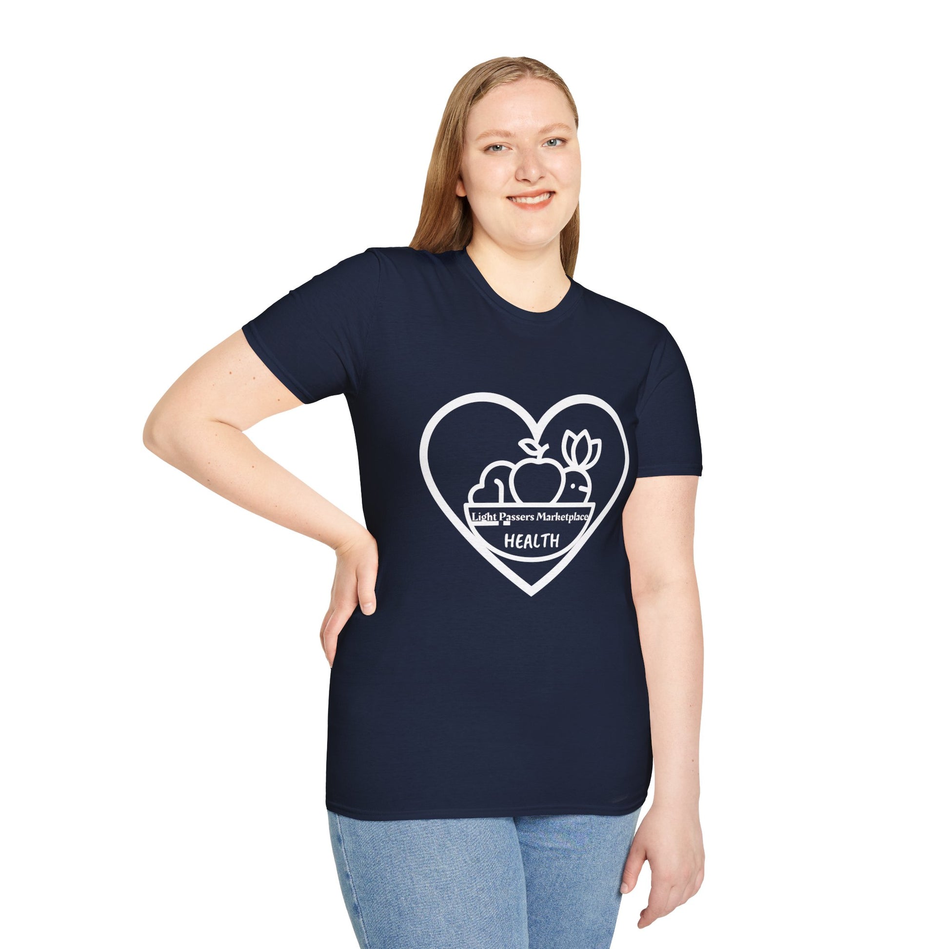 A woman in a blue shirt smiles, showcasing the Light Passers Marketplace Fruit Basket Unisex T-Shirt. The tee, made of soft cotton, features a heart logo and durable twill tape shoulders.