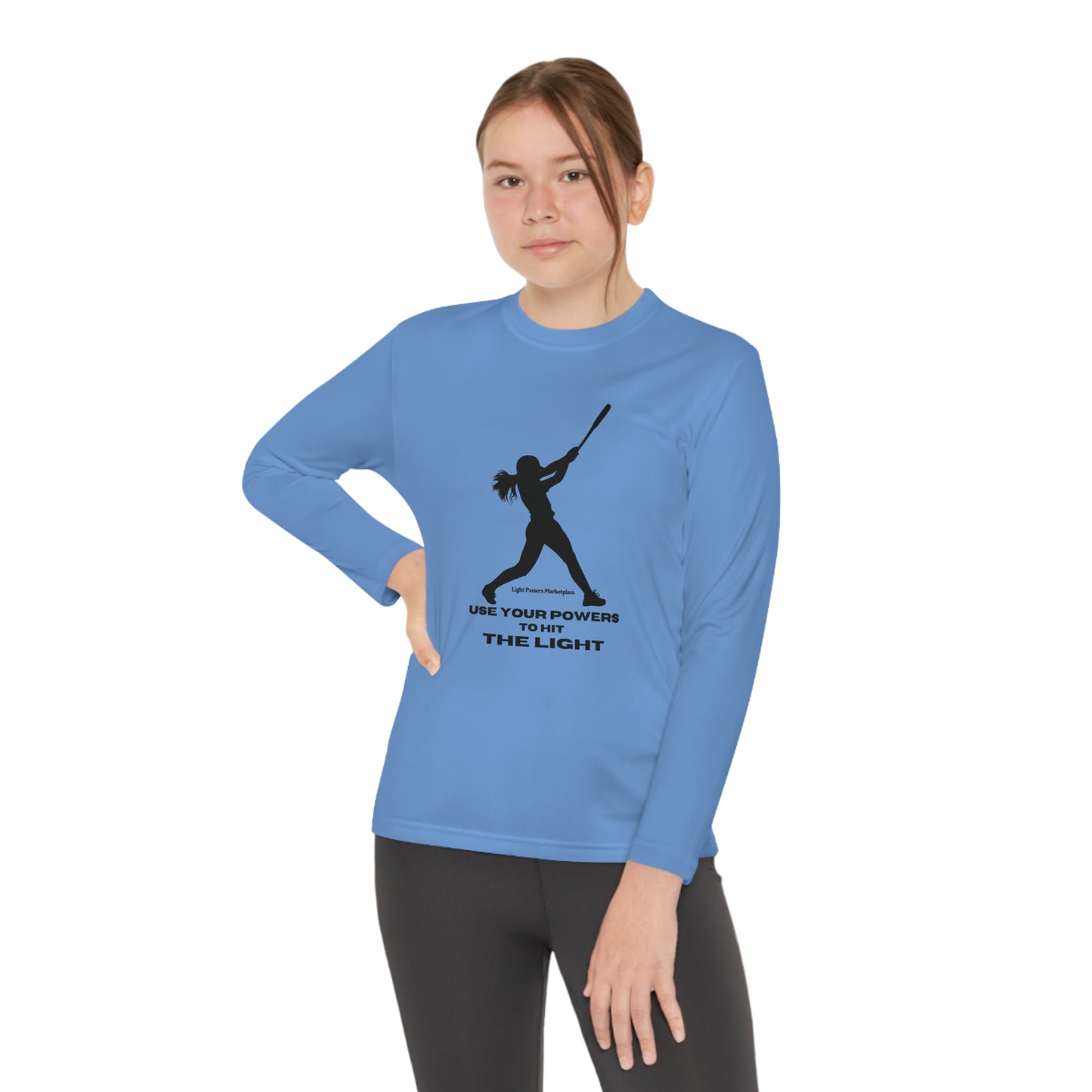 A girl in a blue long-sleeved tee, posing and swinging a bat, embodies active comfort. Made of 100% moisture-wicking polyester, lightweight and breathable for active kids.