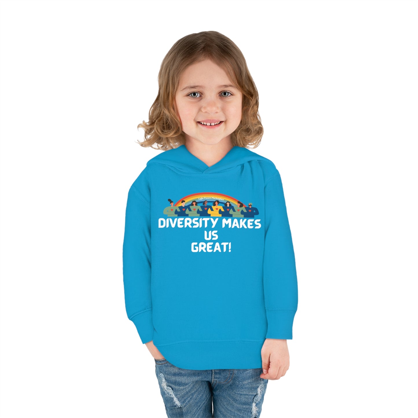 A child in a blue sweatshirt smiles, showcasing the Diversity Makes Us Great Toddler Hooded Sweatshirt. Jersey-lined hood, double-needle stitching, side pockets for lasting coziness.