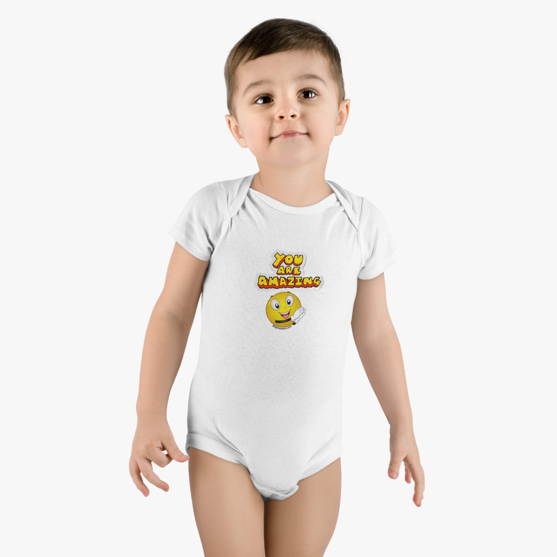 Organic cotton baby Onesie with bottom snap closure. Features expandable lap shoulder neckline, ribbed legs for secure fit. Certified softness, breathability, and elasticity. Onesies® Brand tag included.