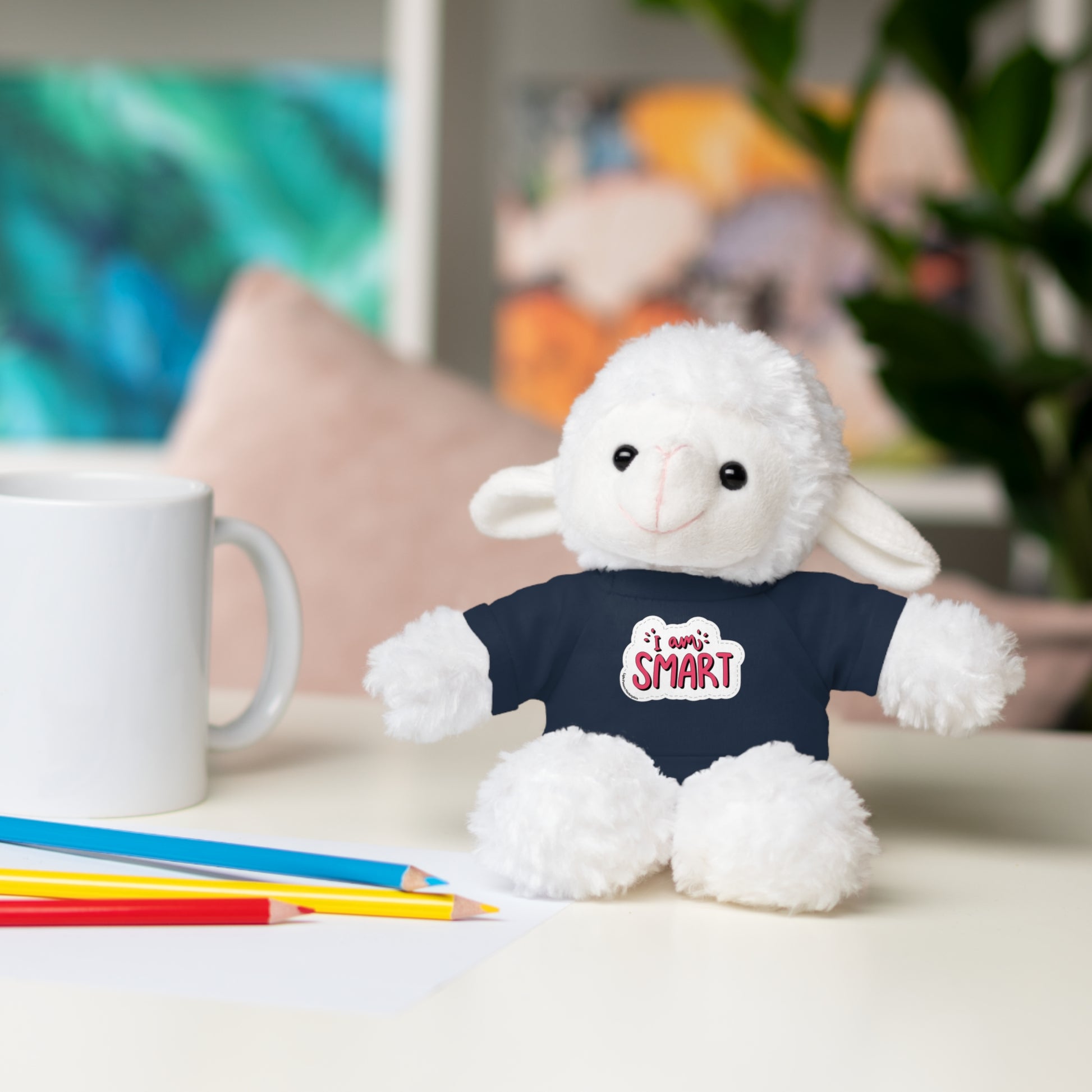 Six plush animals, including a bear and lion, each wearing a removable T-shirt with 'I am Smart' message, from Light Passers Marketplace.