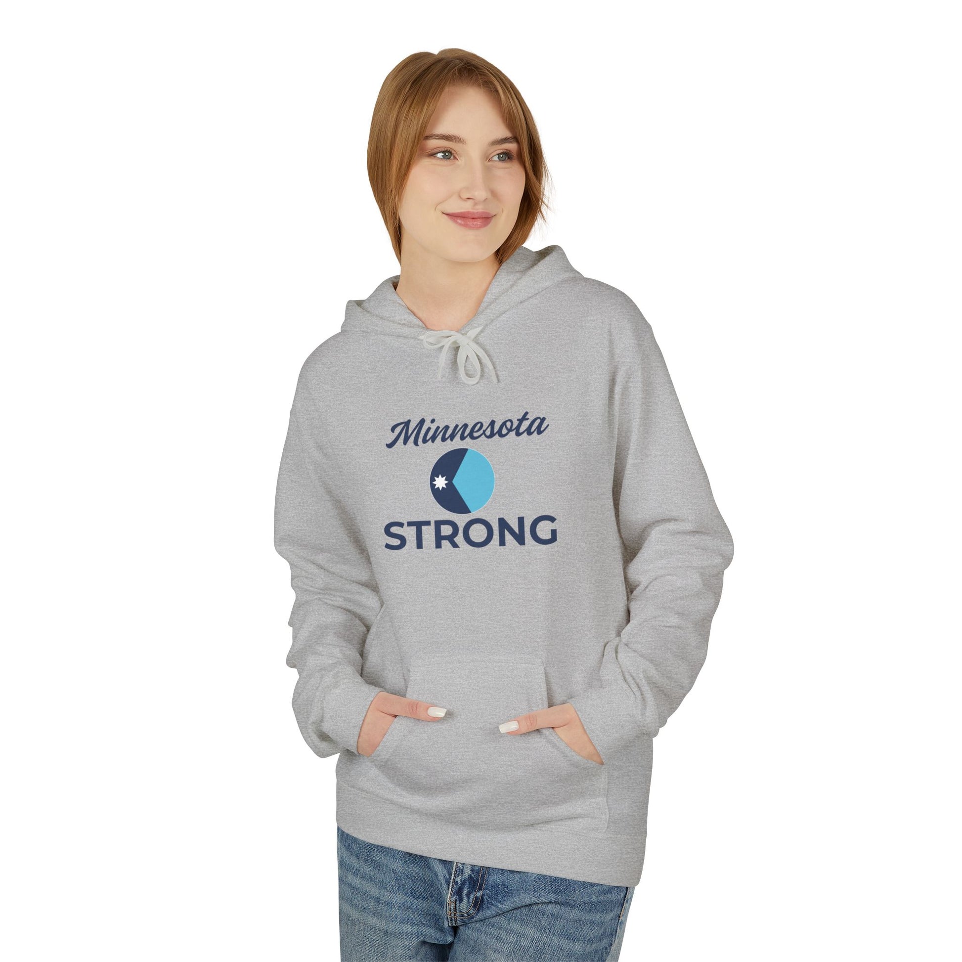 Female model wears the Love and Peace The Light Adult Minnesota Strong Hoodie, showcasing a blue graphic and Minnesota STRONG text, reflecting cozy, community spirit.