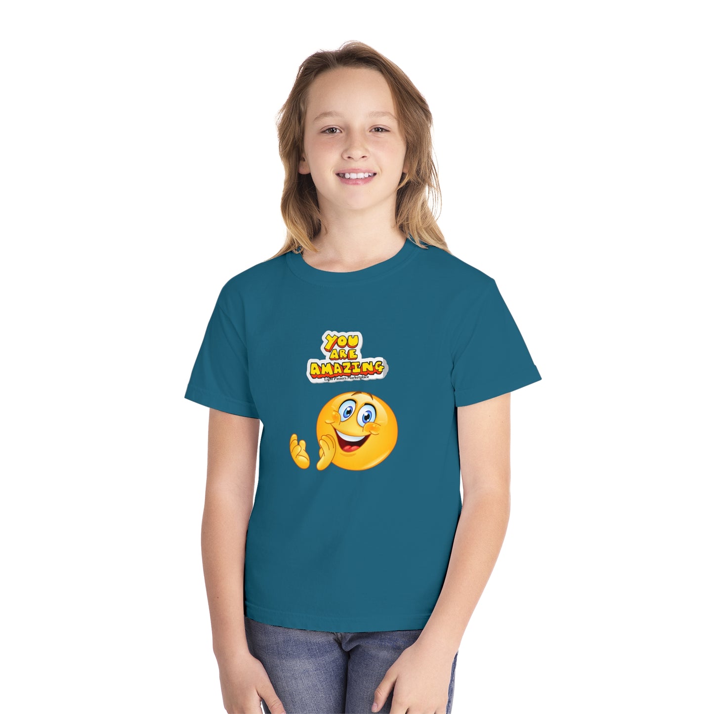 A youth t-shirt featuring a girl in a blue shirt, embodying comfort and agility. Made of 100% combed ringspun cotton, soft-washed, garment-dyed, with a classic fit for all-day wear.