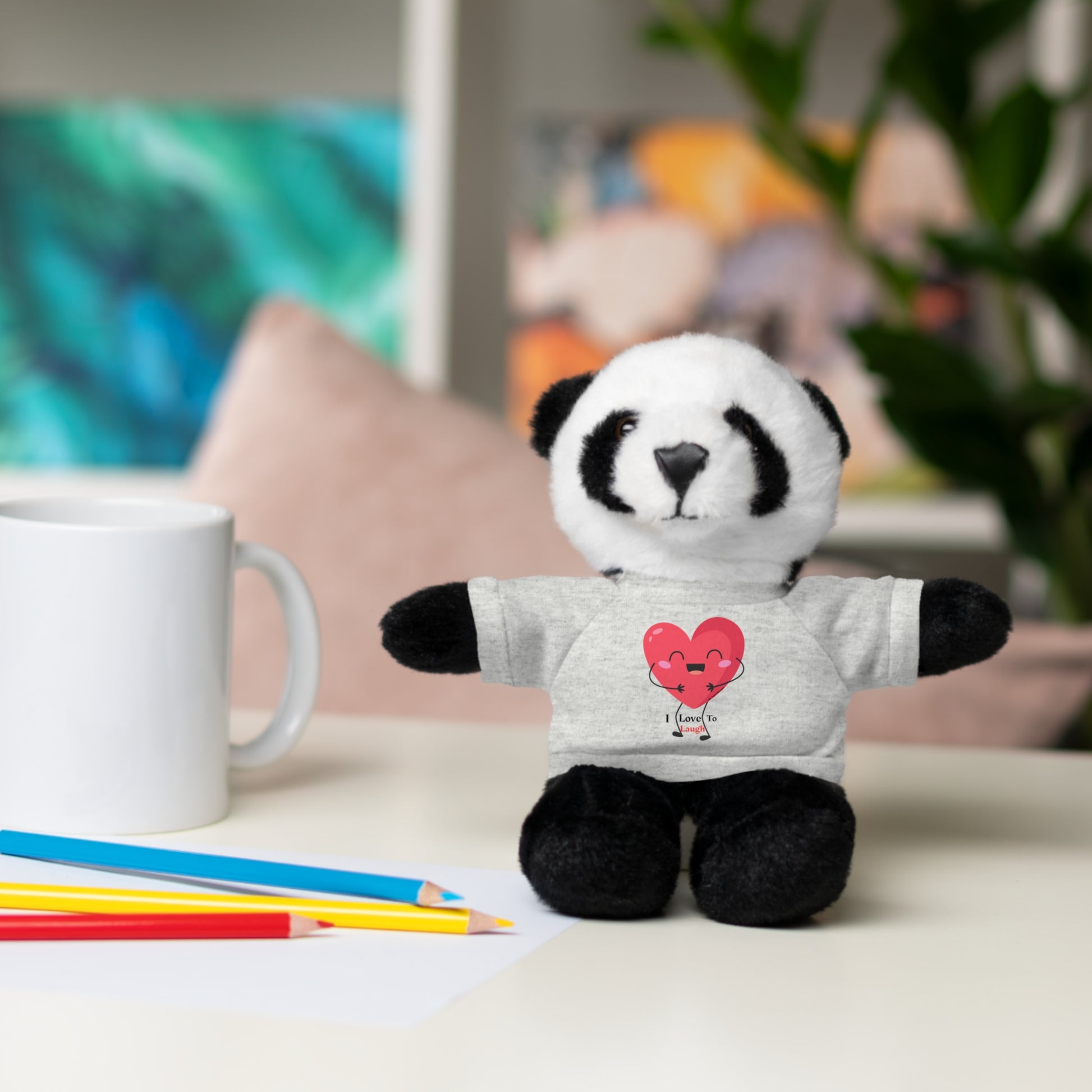 Stuffed panda bear wearing a removable I Love to Laugh heart shirt, part of Cool Stuff Stuffies collection, ideal for gifting and cuddling.