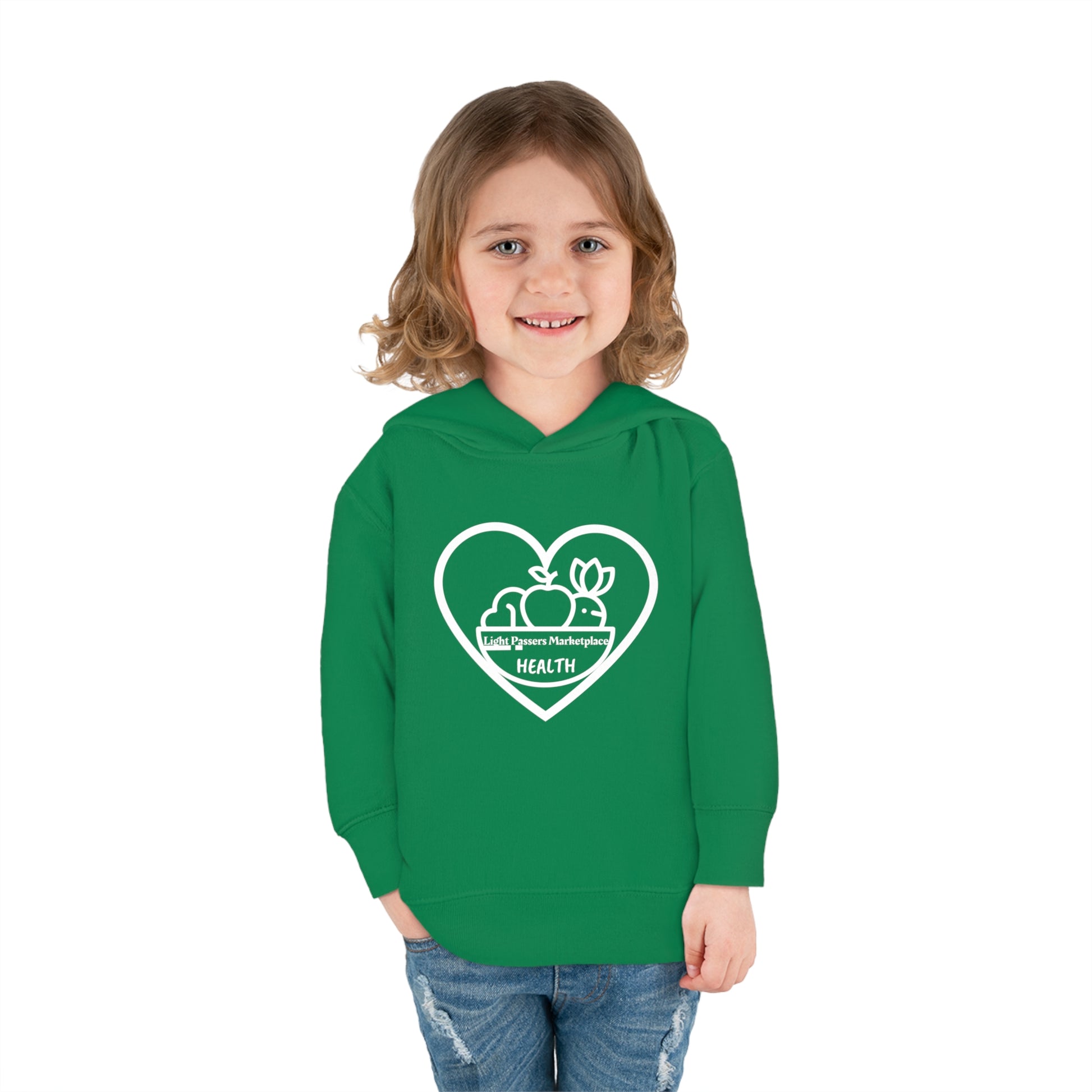 A toddler wearing a green Rabbit Skins hoodie, smiling at the camera. Features jersey-lined hood, cover-stitched details, side seam pockets, and durable 60% cotton, 40% polyester fabric for cozy wear.