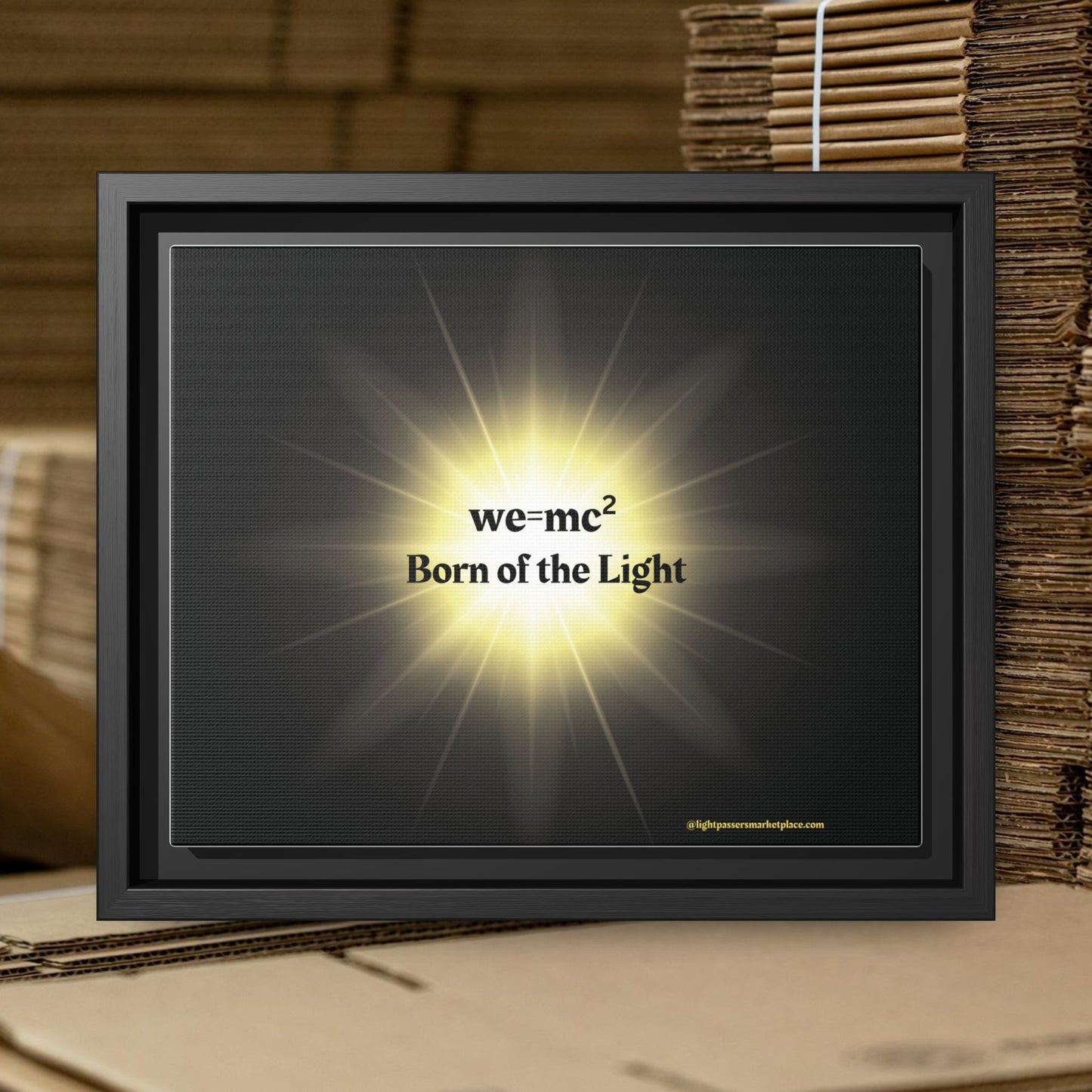Inspirational Framed Canvas Art - we=mc² Born of the Light, featuring a black frame and radiant display, ideal for uplifting any space.