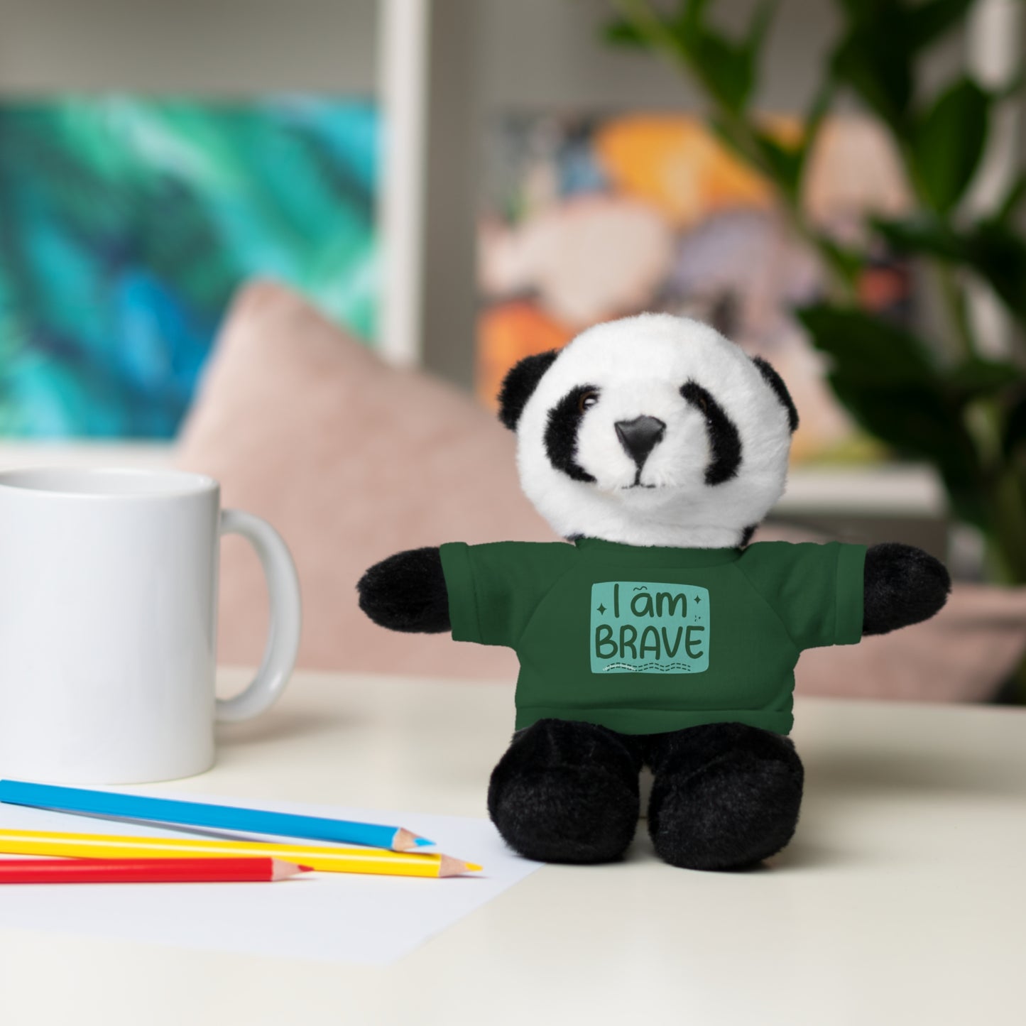 Stuffed panda bear wearing a green I am Brave tee, part of Cool Stuff Stuffies collection, featuring customizable shirts and soft, cuddly design.
