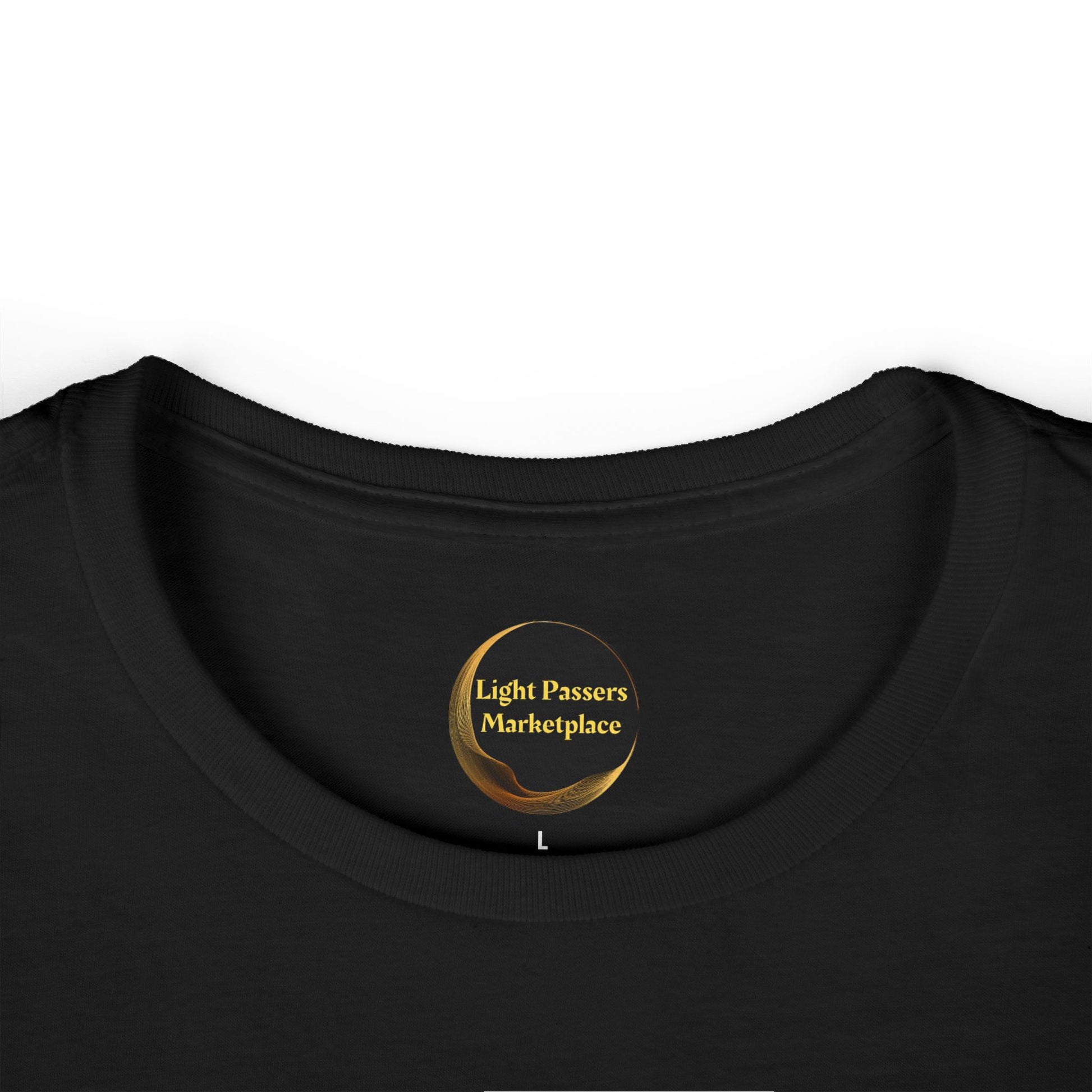 The inside back of a black tee's neckline, featuring a gold Light Passers Marketplace logo, represents the Women's Tee - Magical Unicorn Stretch for Health.