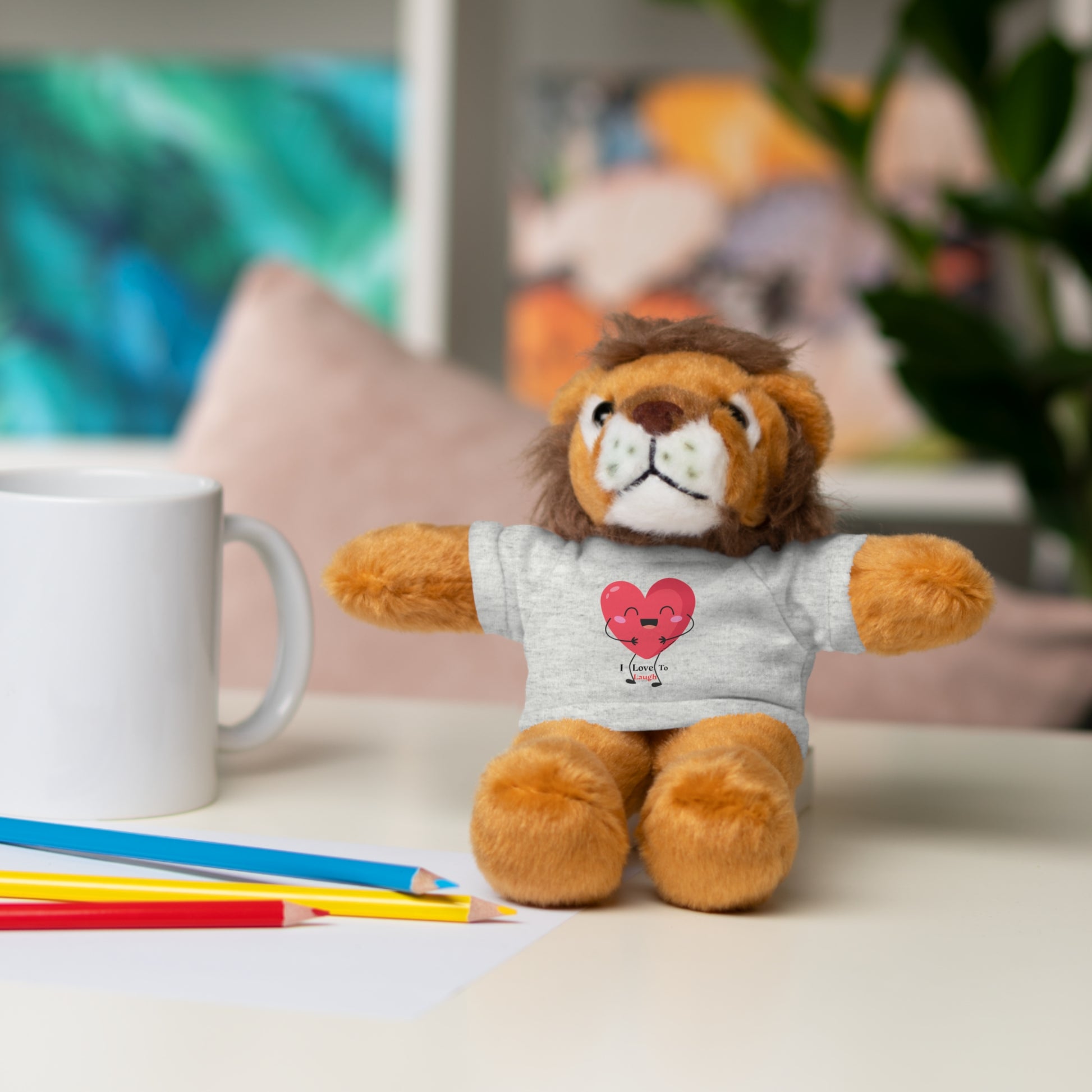 Cool Stuff Stuffies plush toy with a removable I Love to Laugh heart shirt, available in 6 animal options, perfect for gifting and cuddling.