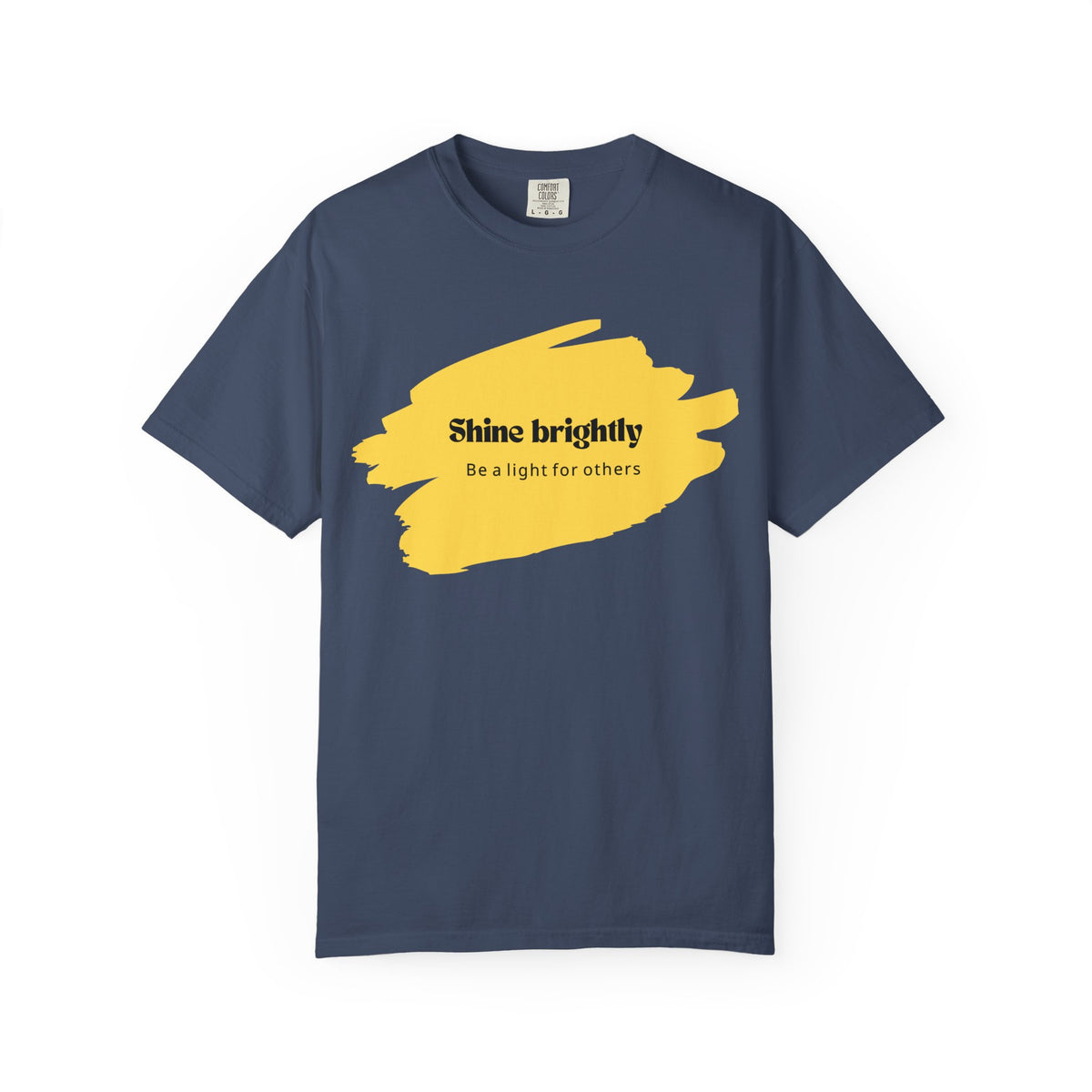 Midnight unisex T-shirt with yellow paint-splash graphic and “Shine brightly” text