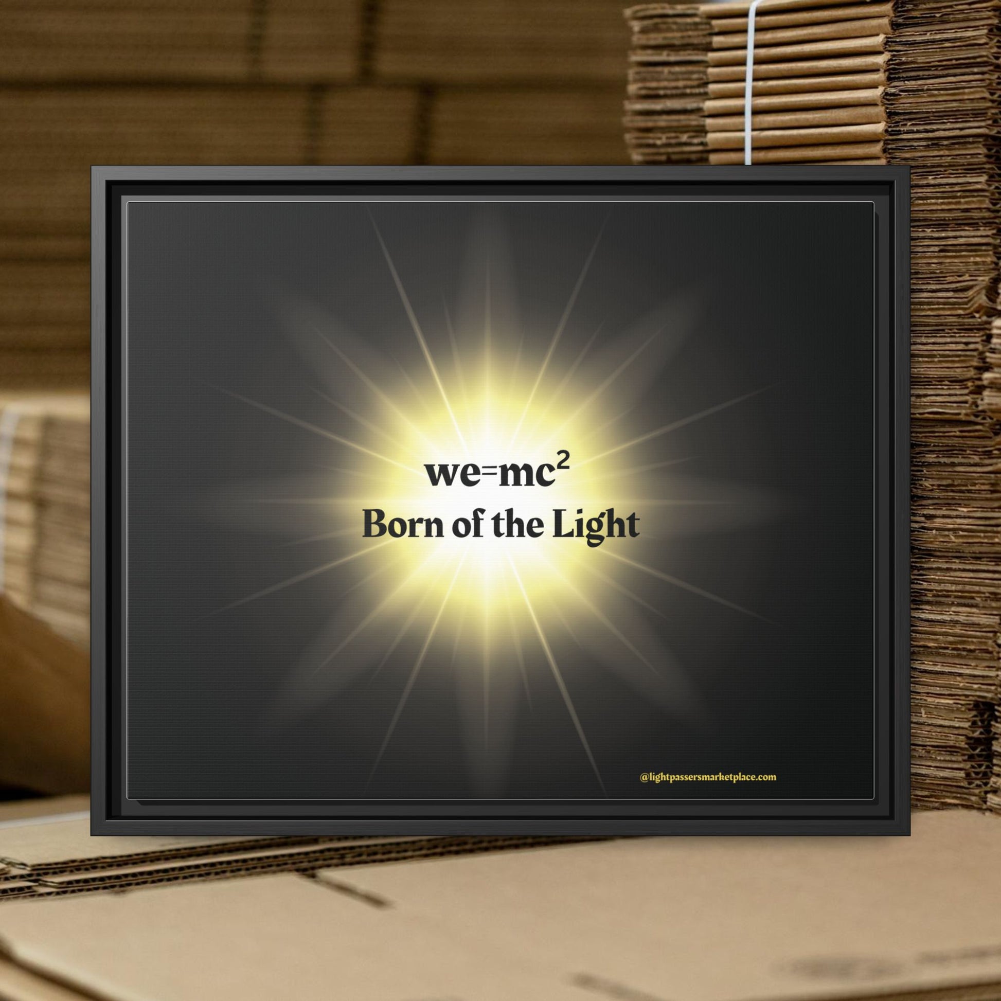 Inspirational Framed Canvas Art - we=mc² Born of the Light, featuring a black frame with a radiant yellow light, enhancing any space with motivating art.